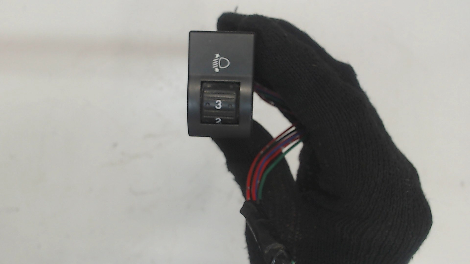 Кнопка корректора фар