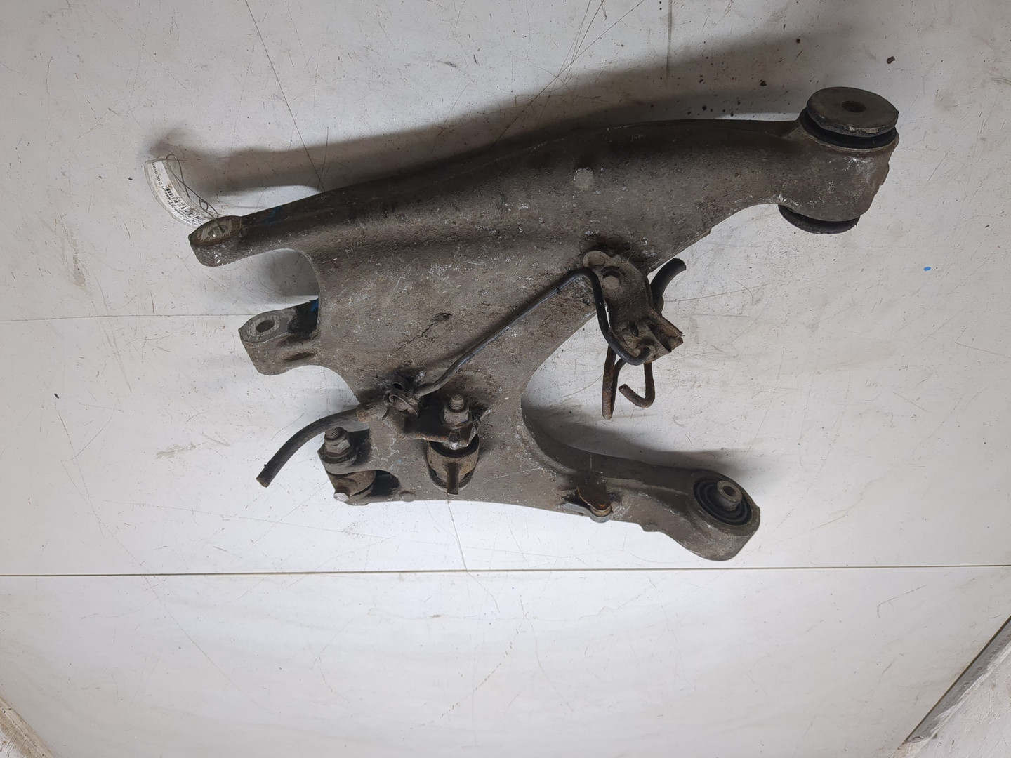 Рычаг задний левый