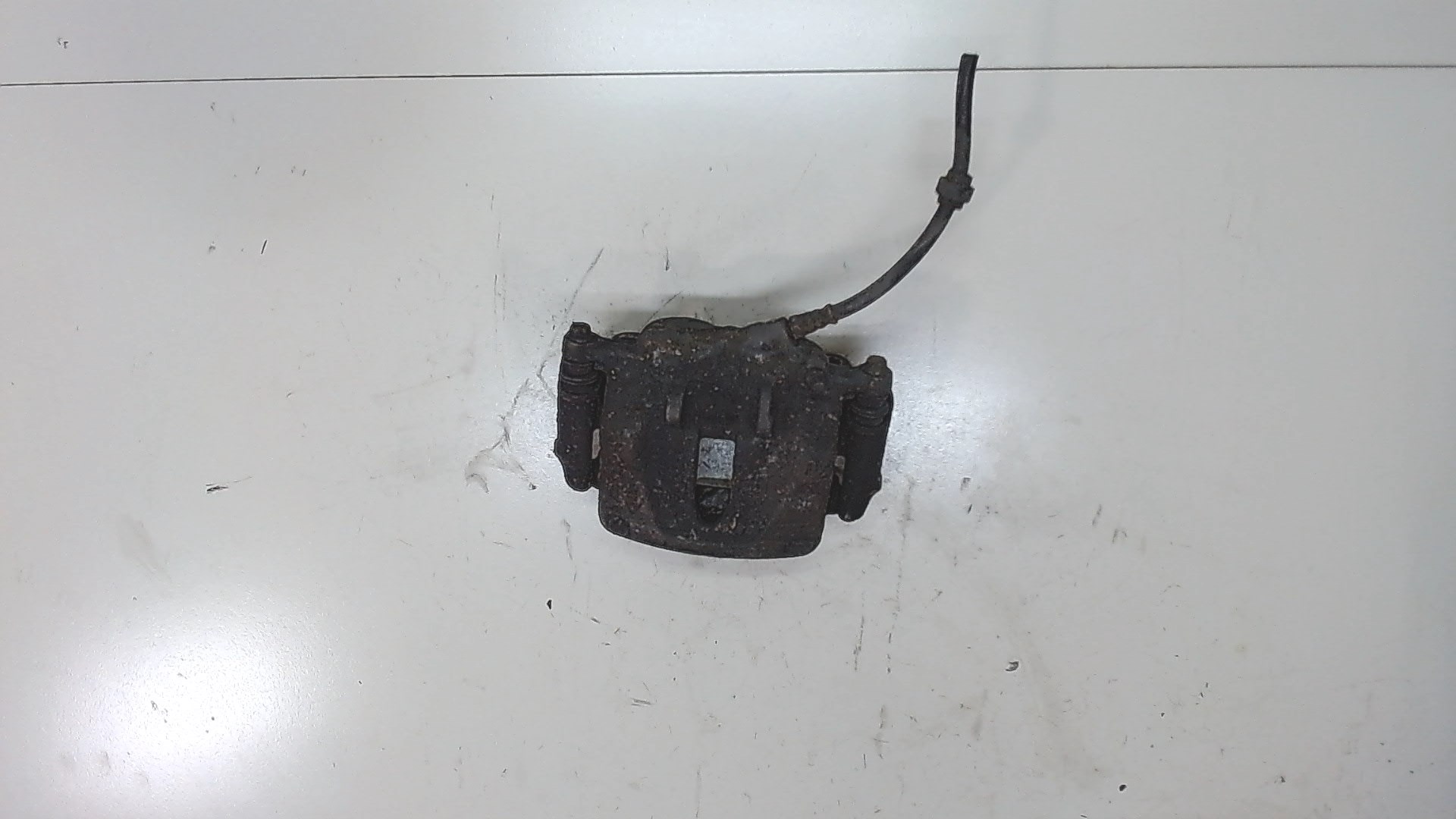 Суппорт передний левый