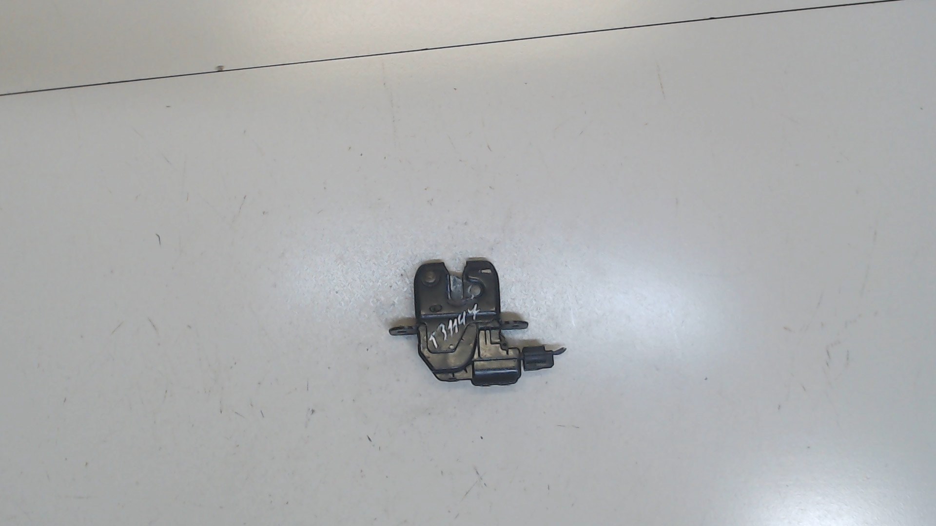 Замок багажника