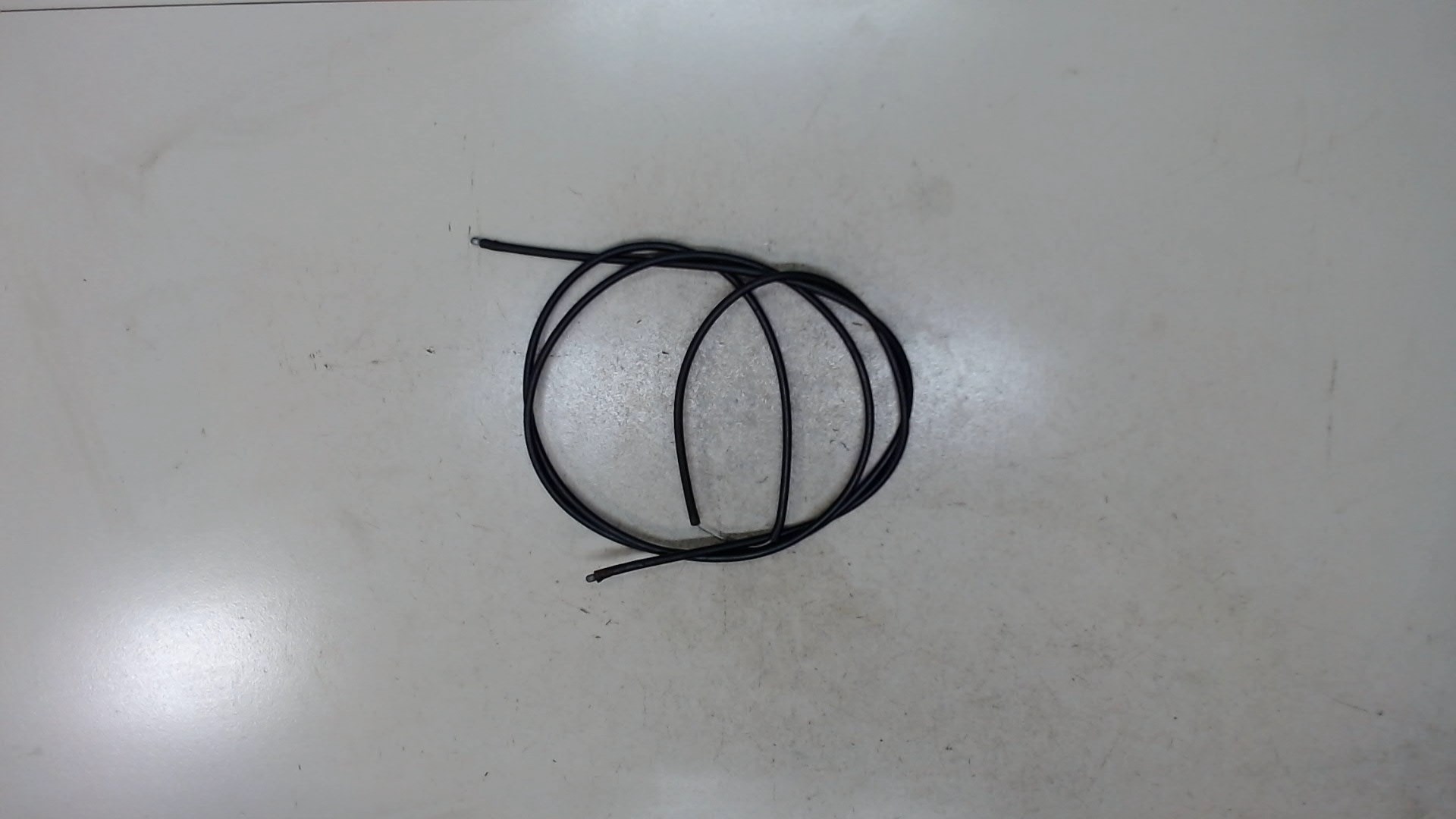 Трос лючка бензобака