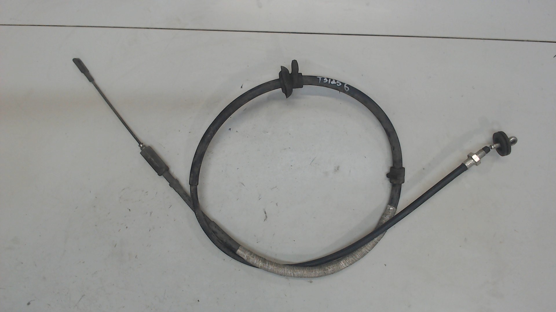 Трос стояночного тормоза