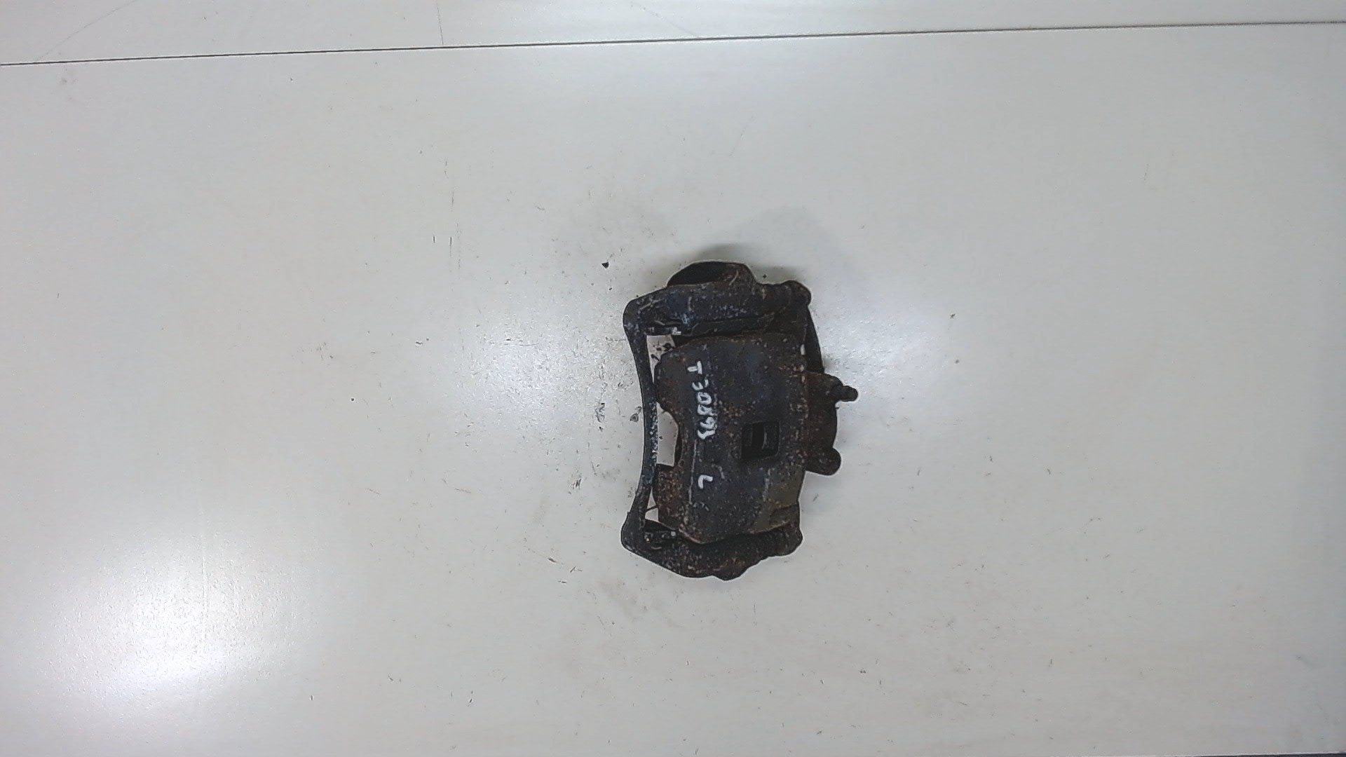 Суппорт передний левый