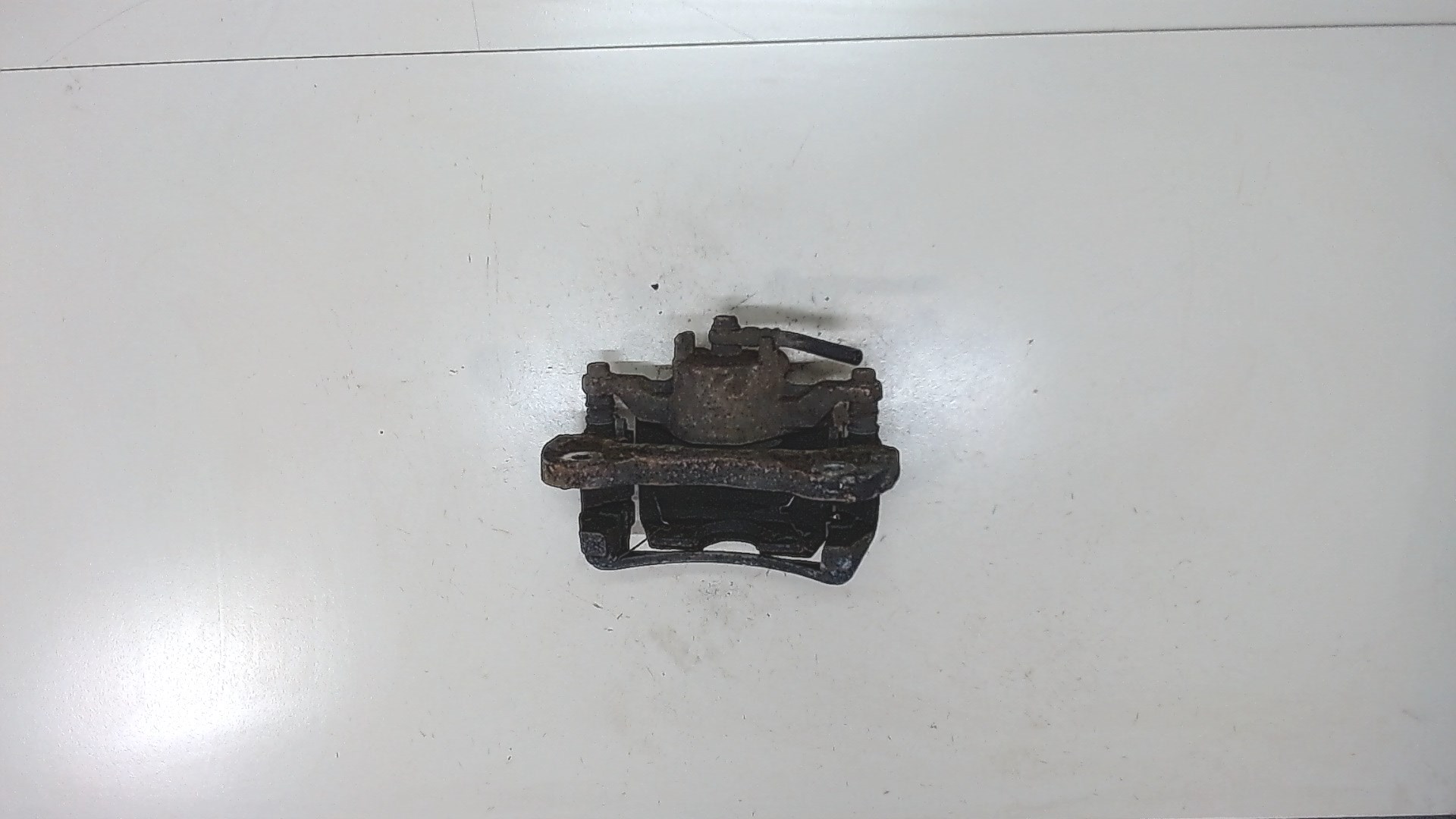 Суппорт передний левый