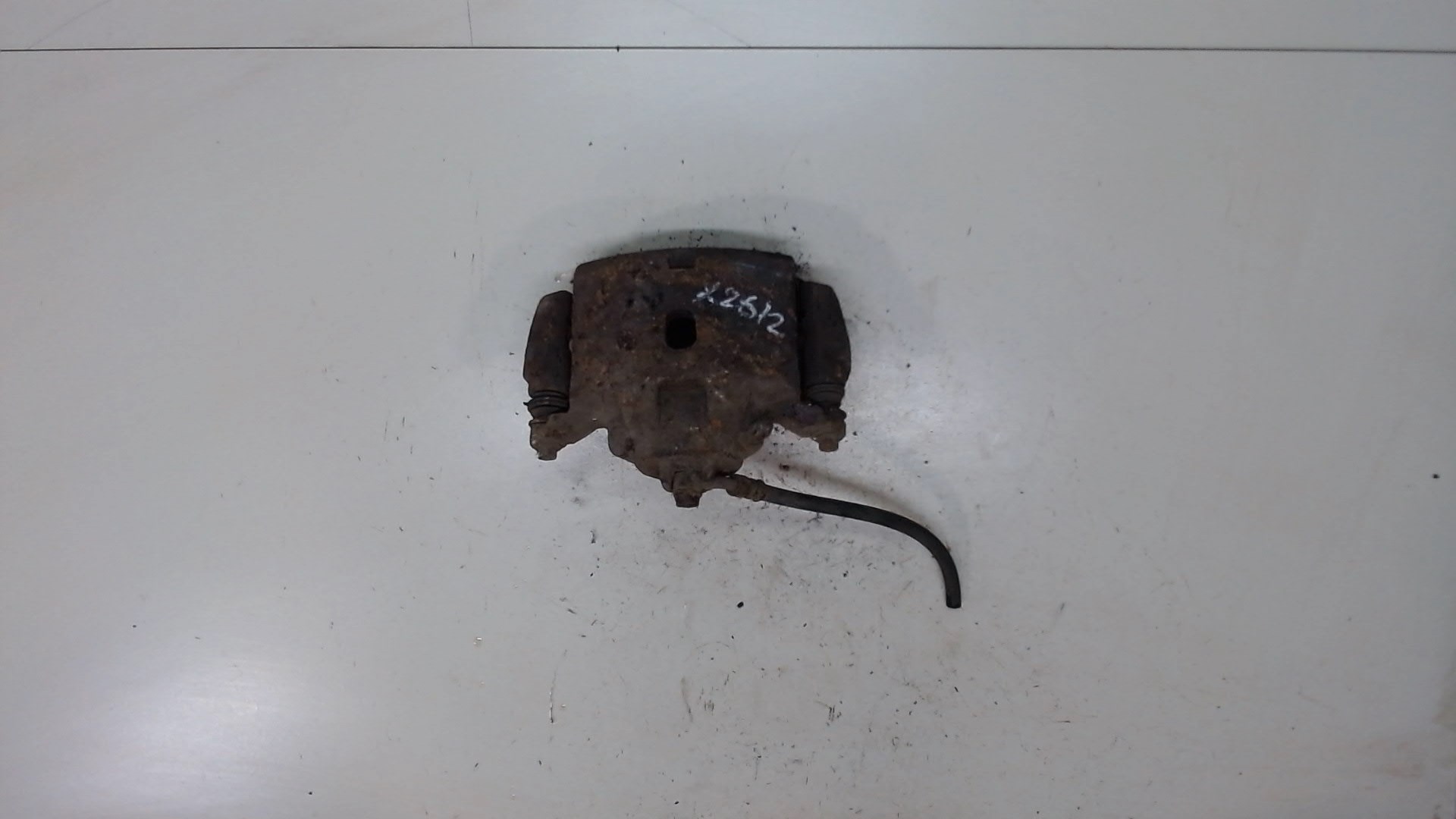 Суппорт передний левый