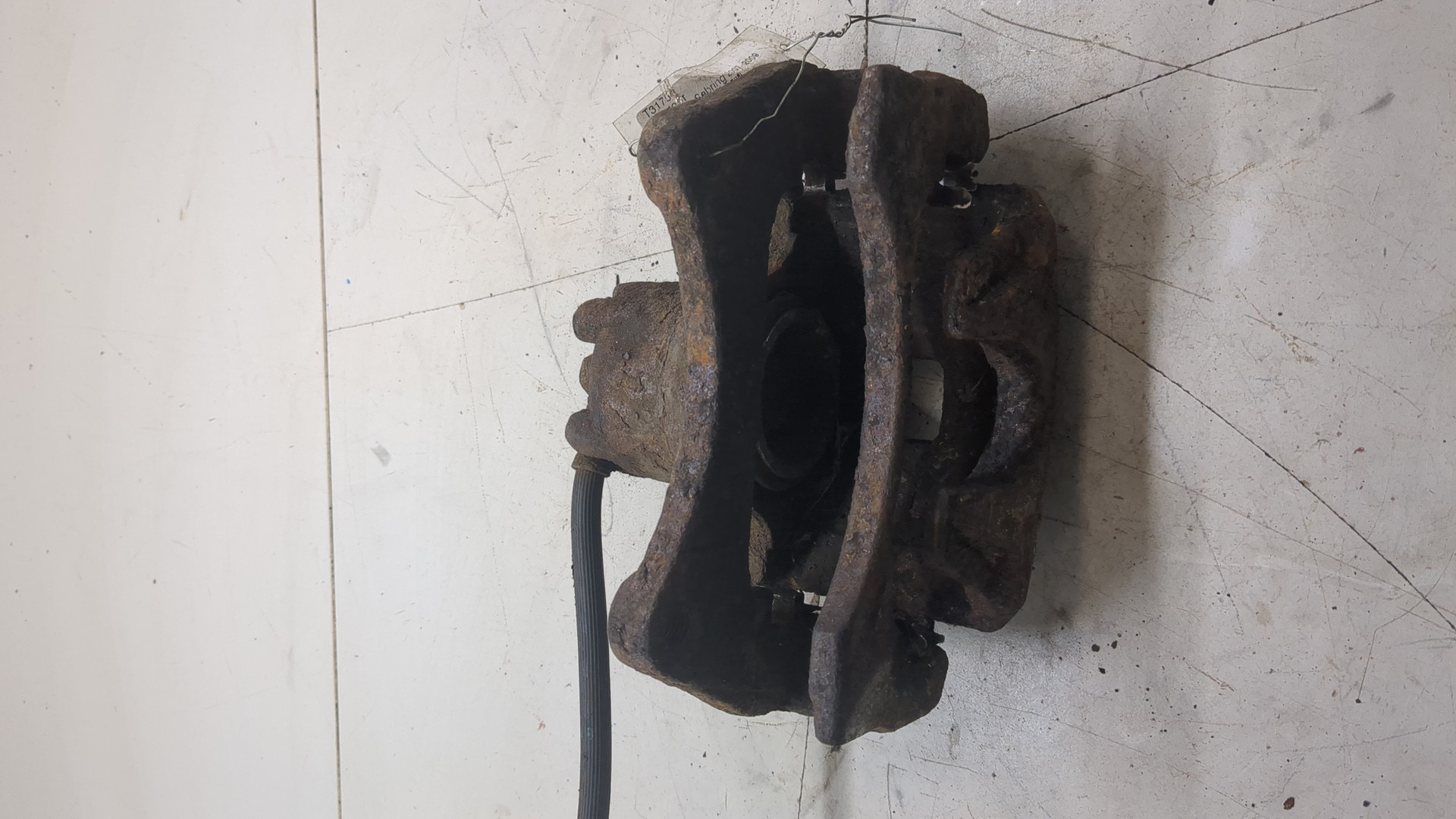 Суппорт передний левый