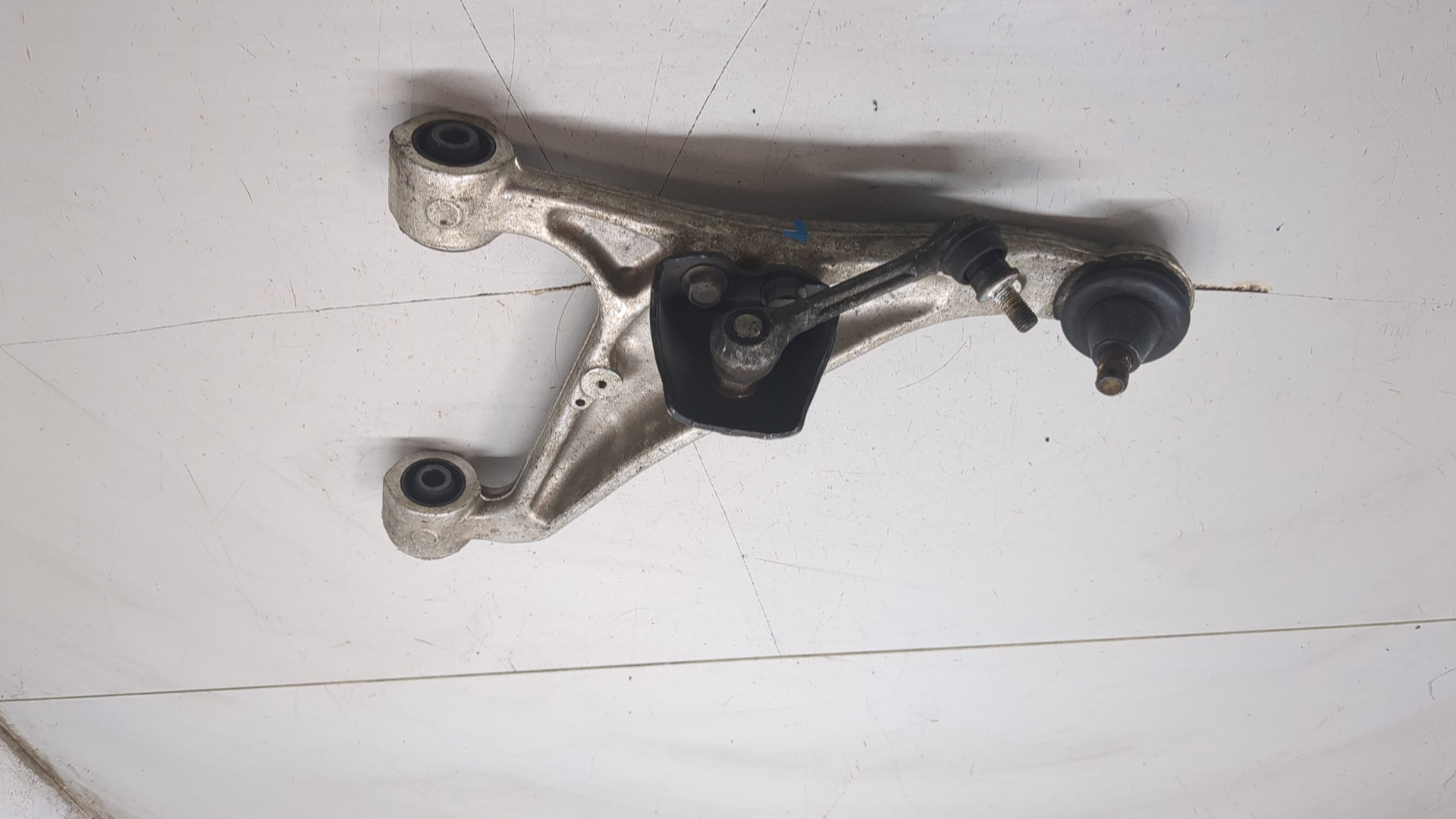 Рычаг задний левый