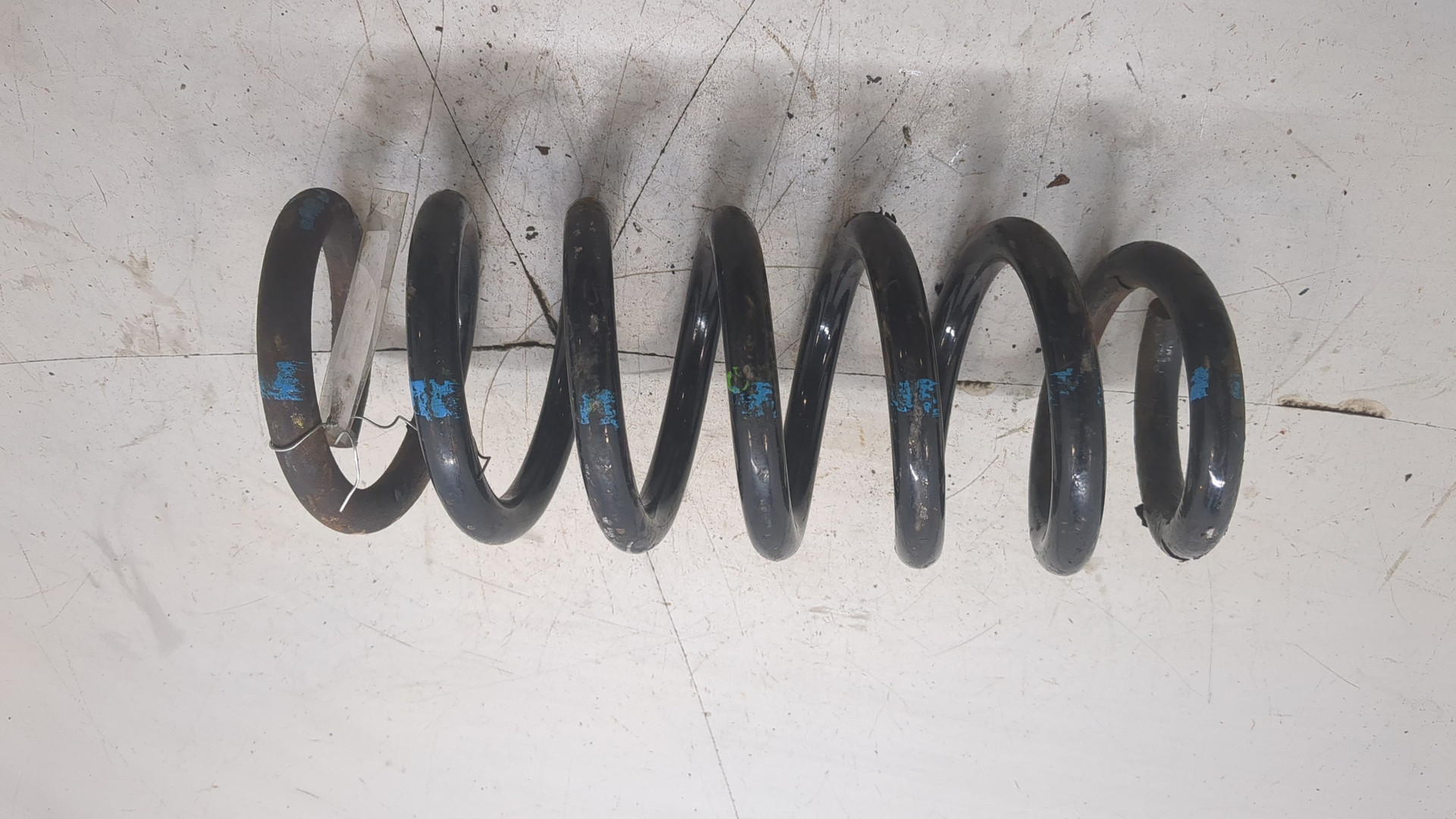 Пружина задняя