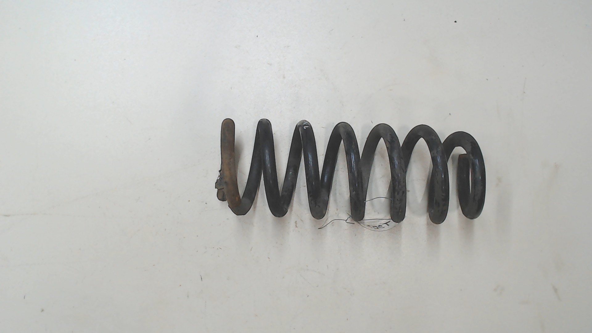 Пружина задняя