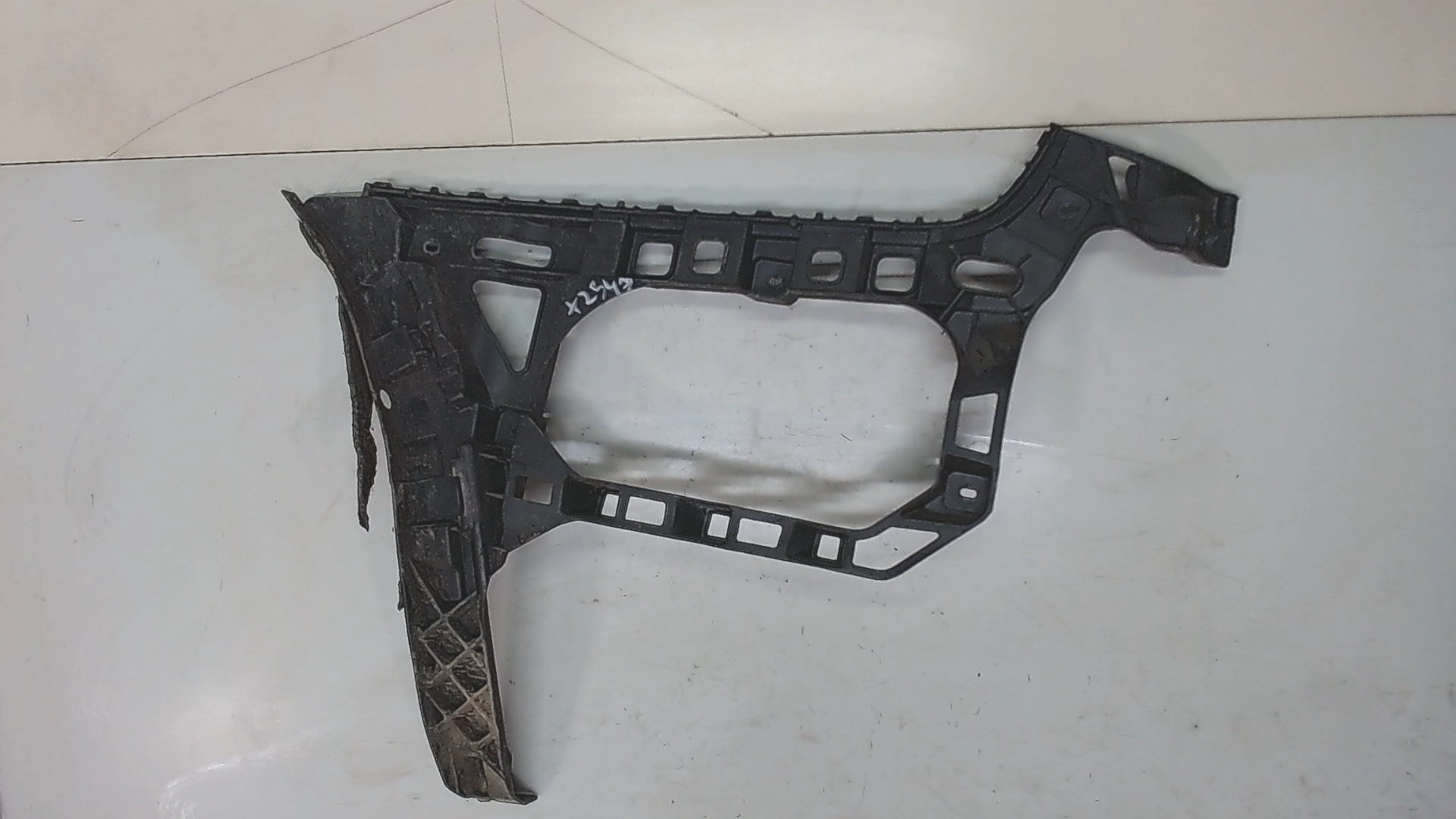 Кронштейн заднего бампера левый