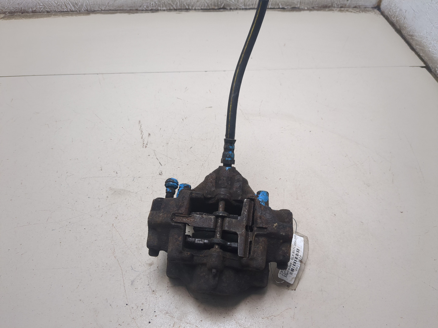 Суппорт задний левый