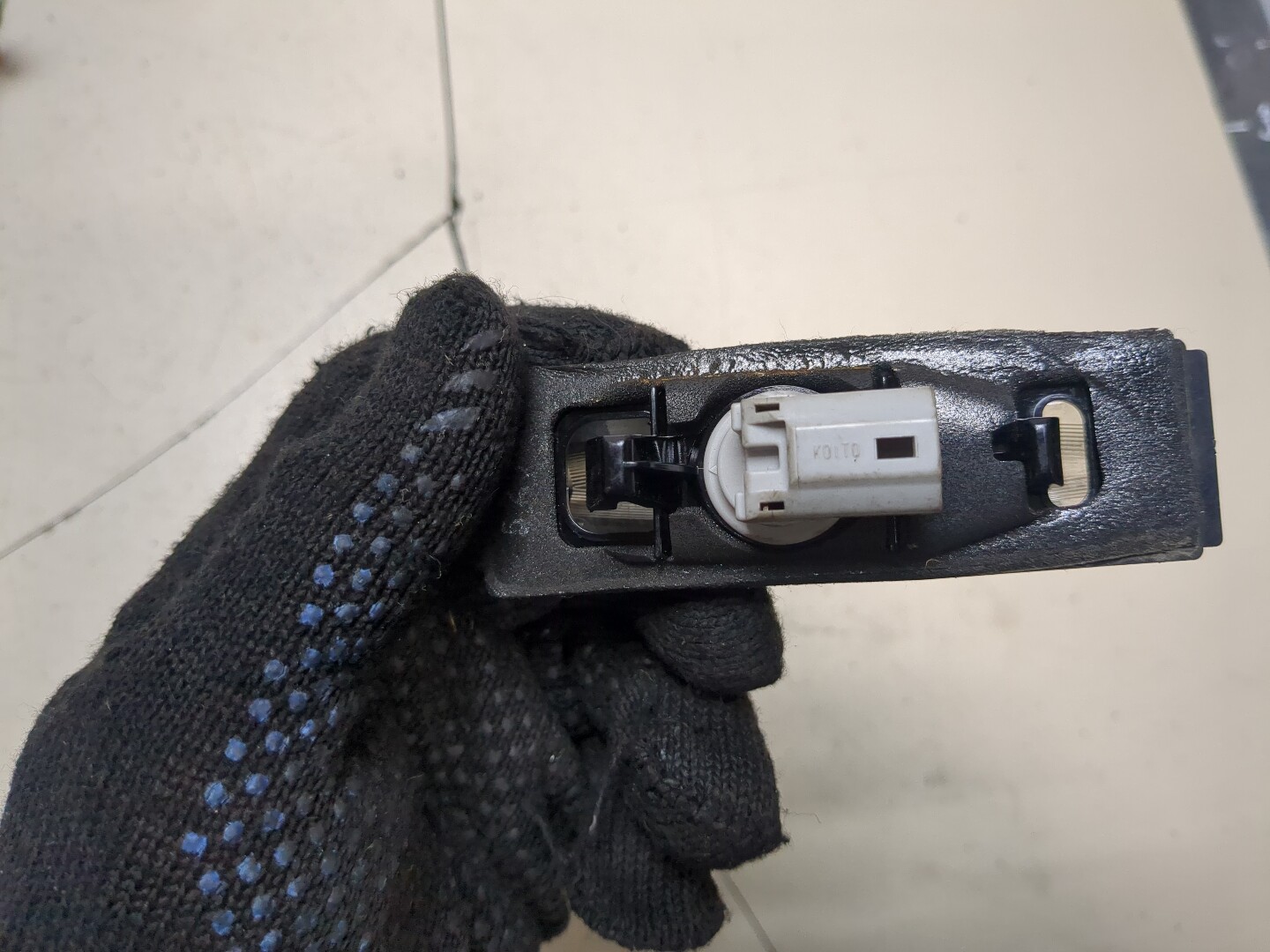 Фонарь подсветки номера