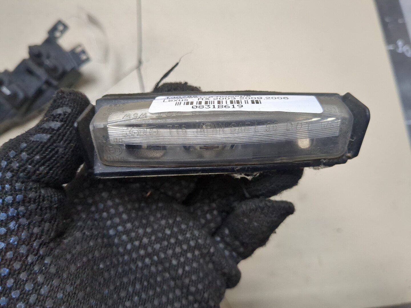 Фонарь подсветки номера