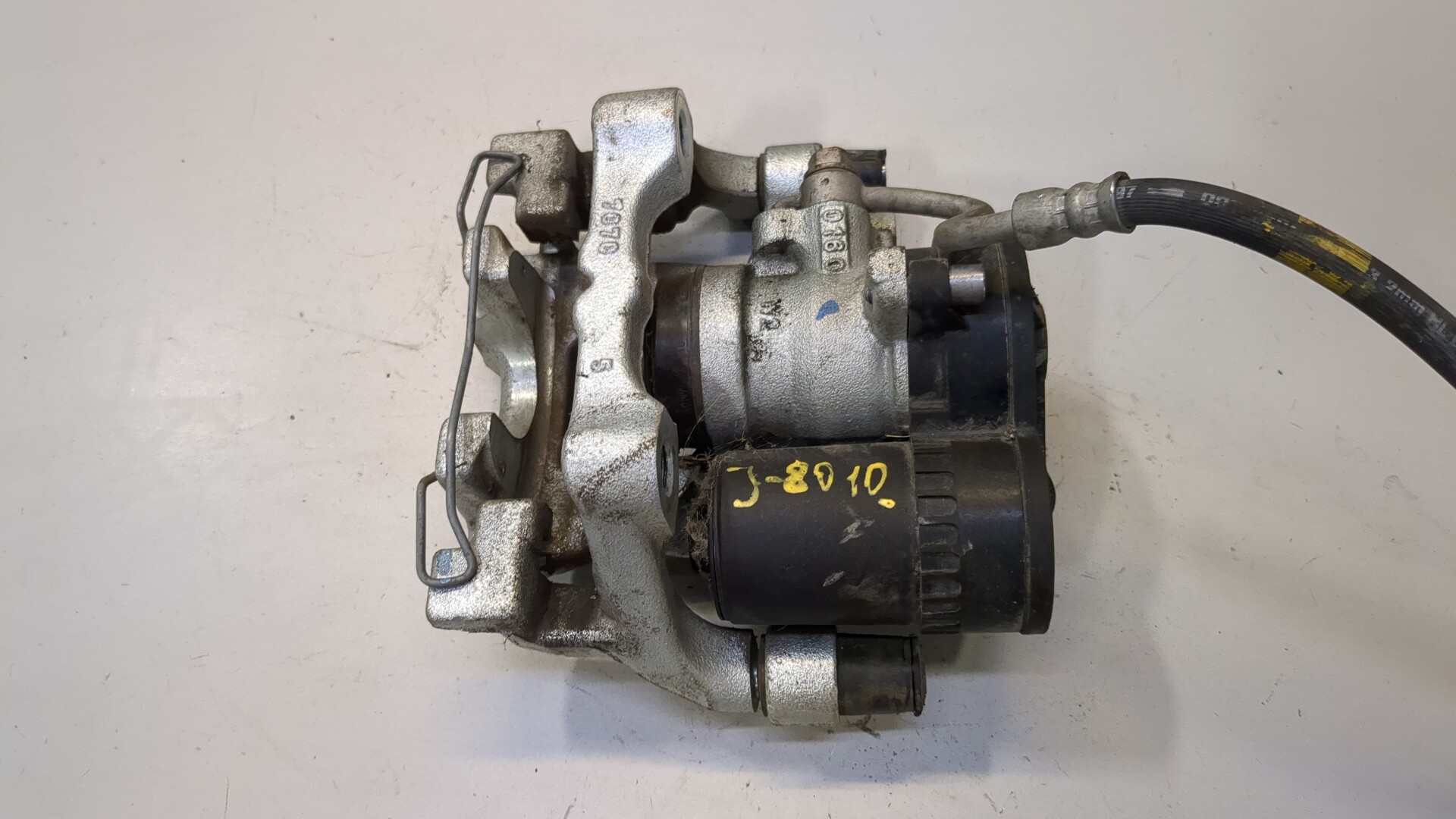 Суппорт задний левый