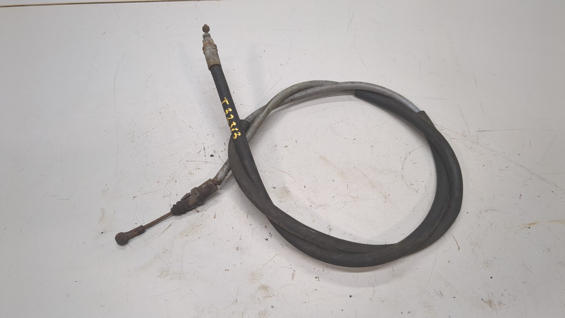 Трос стояночного тормоза