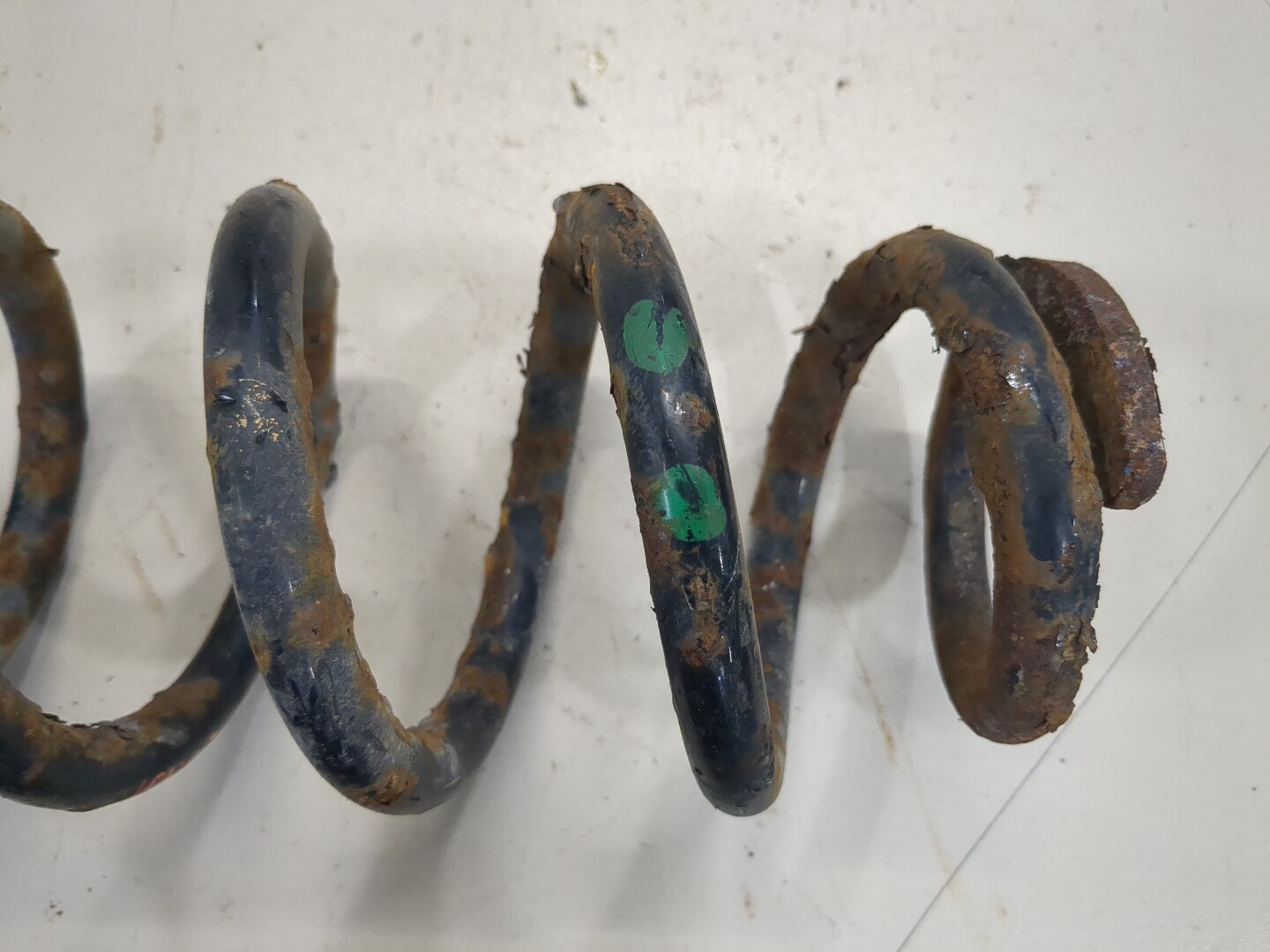 Пружина задняя