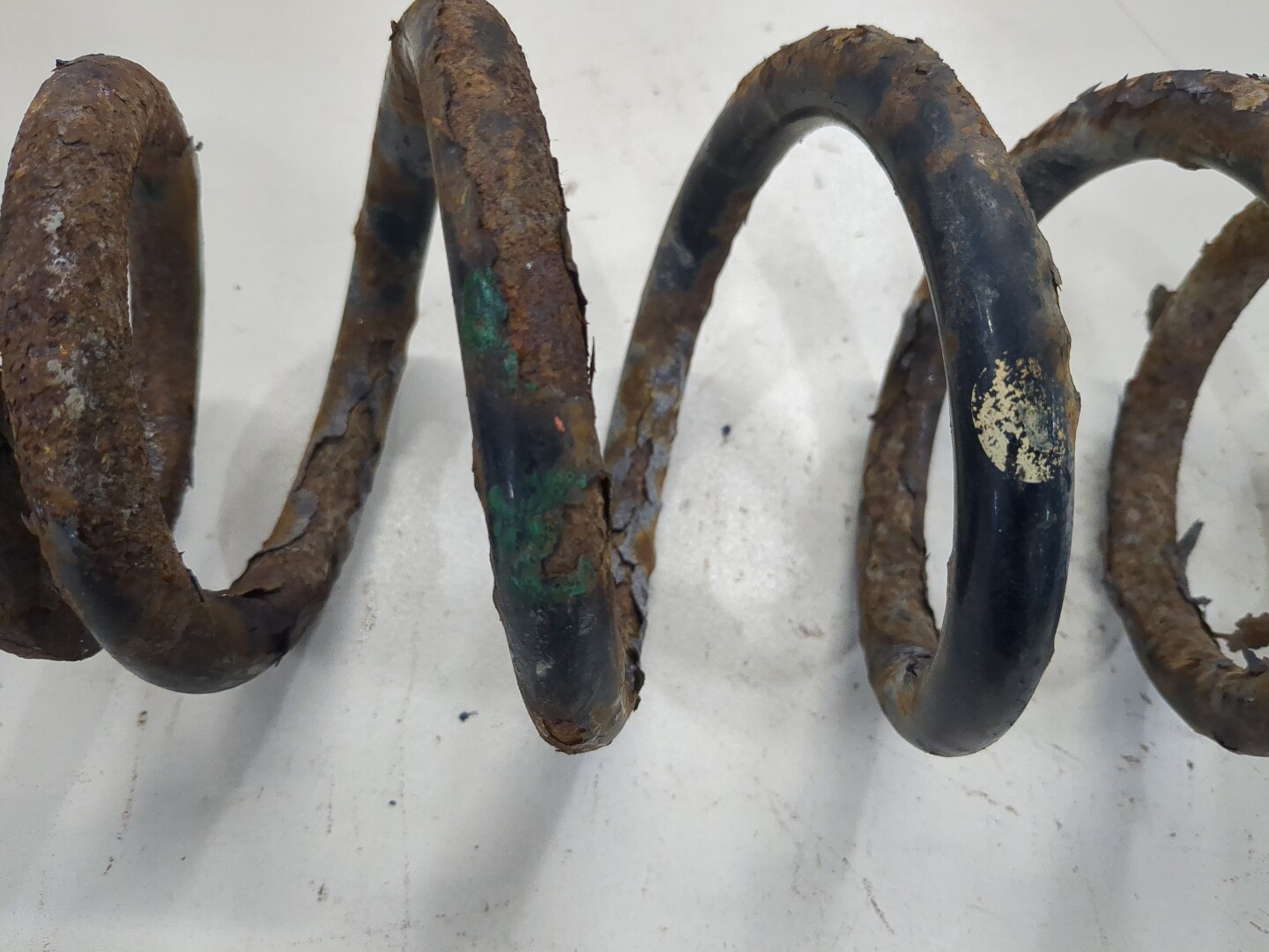 Пружина задняя