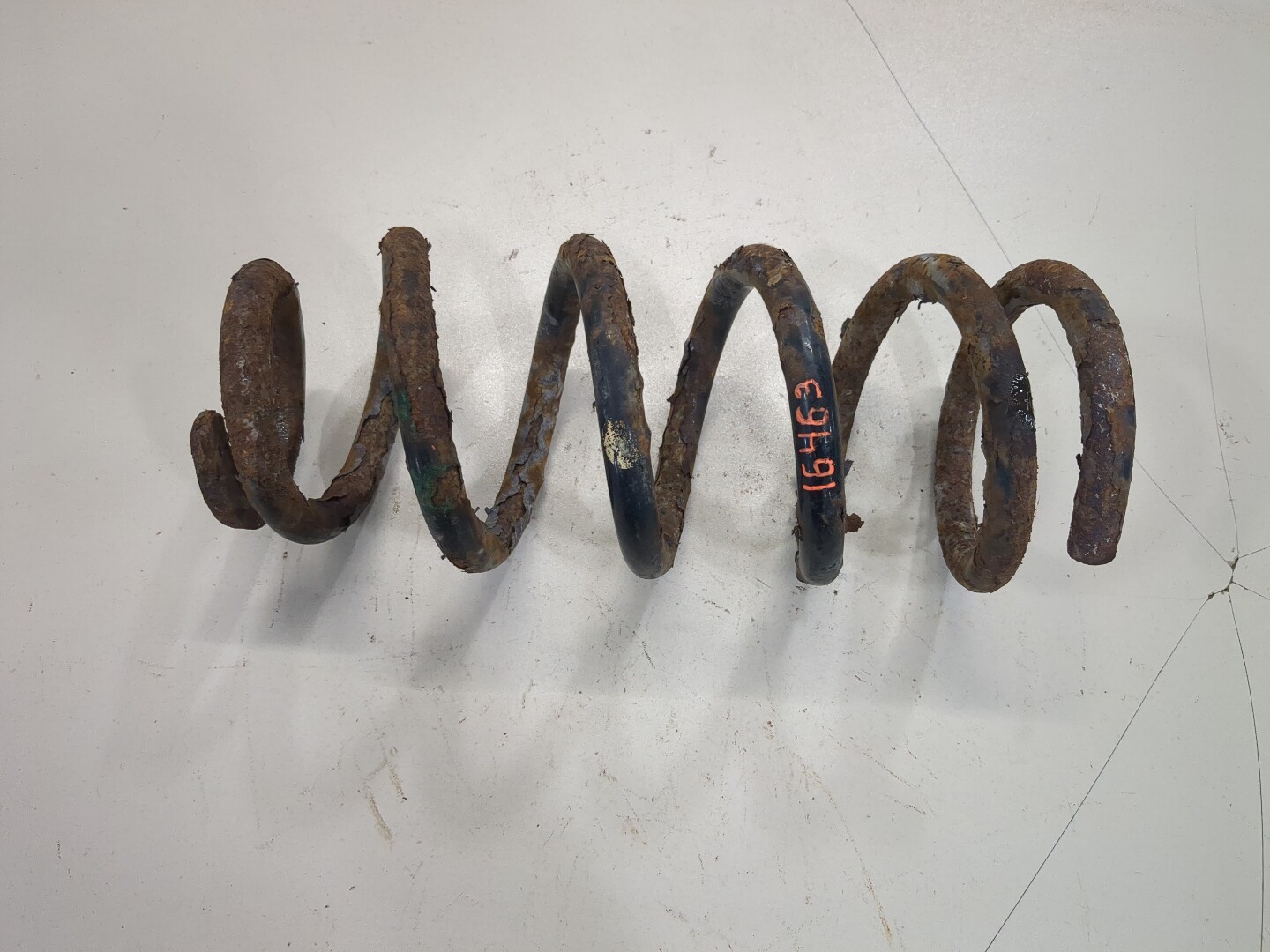 Пружина задняя