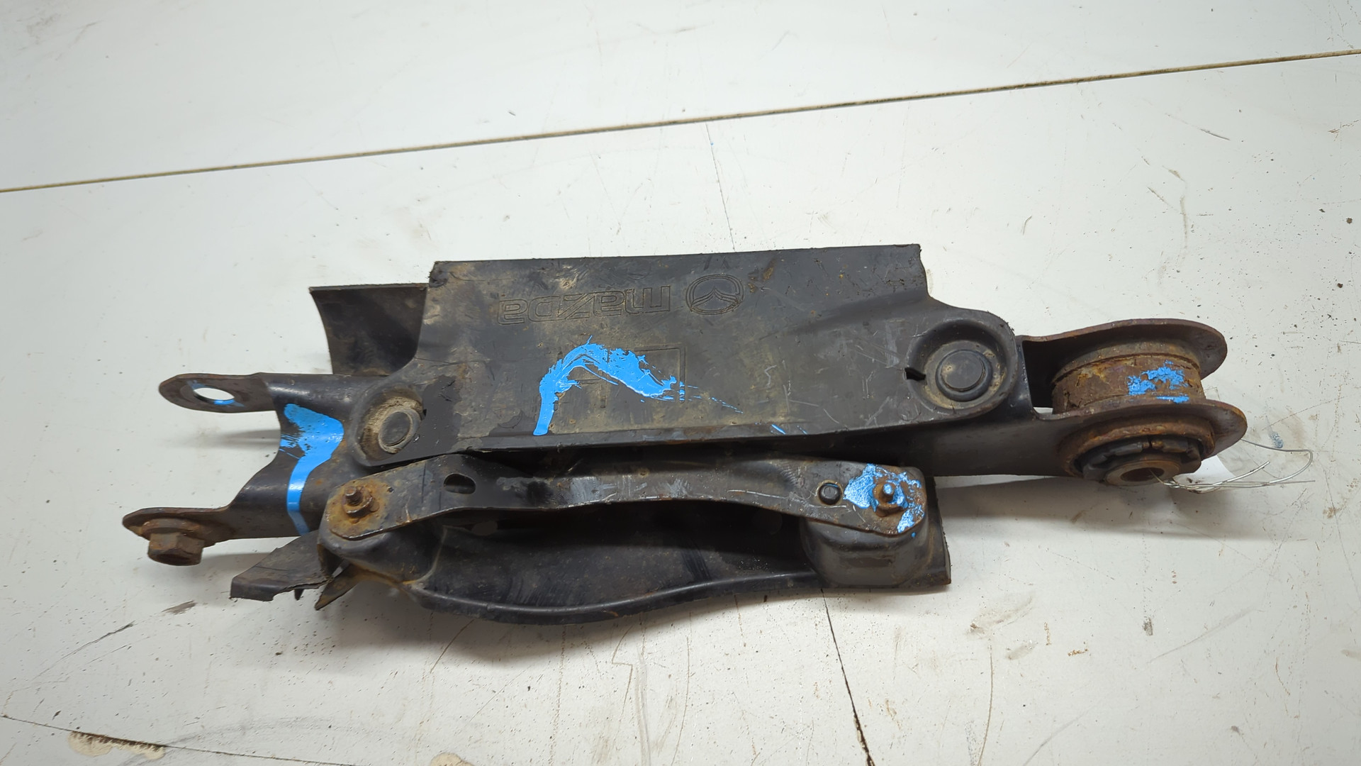 Рычаг задний левый