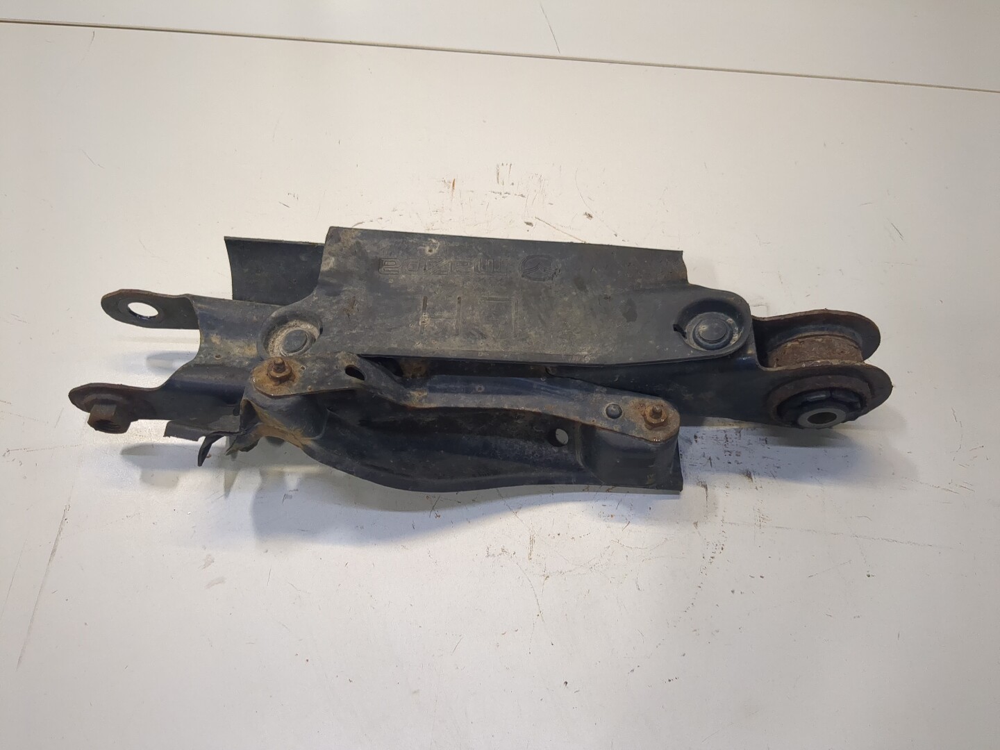 Рычаг задний левый