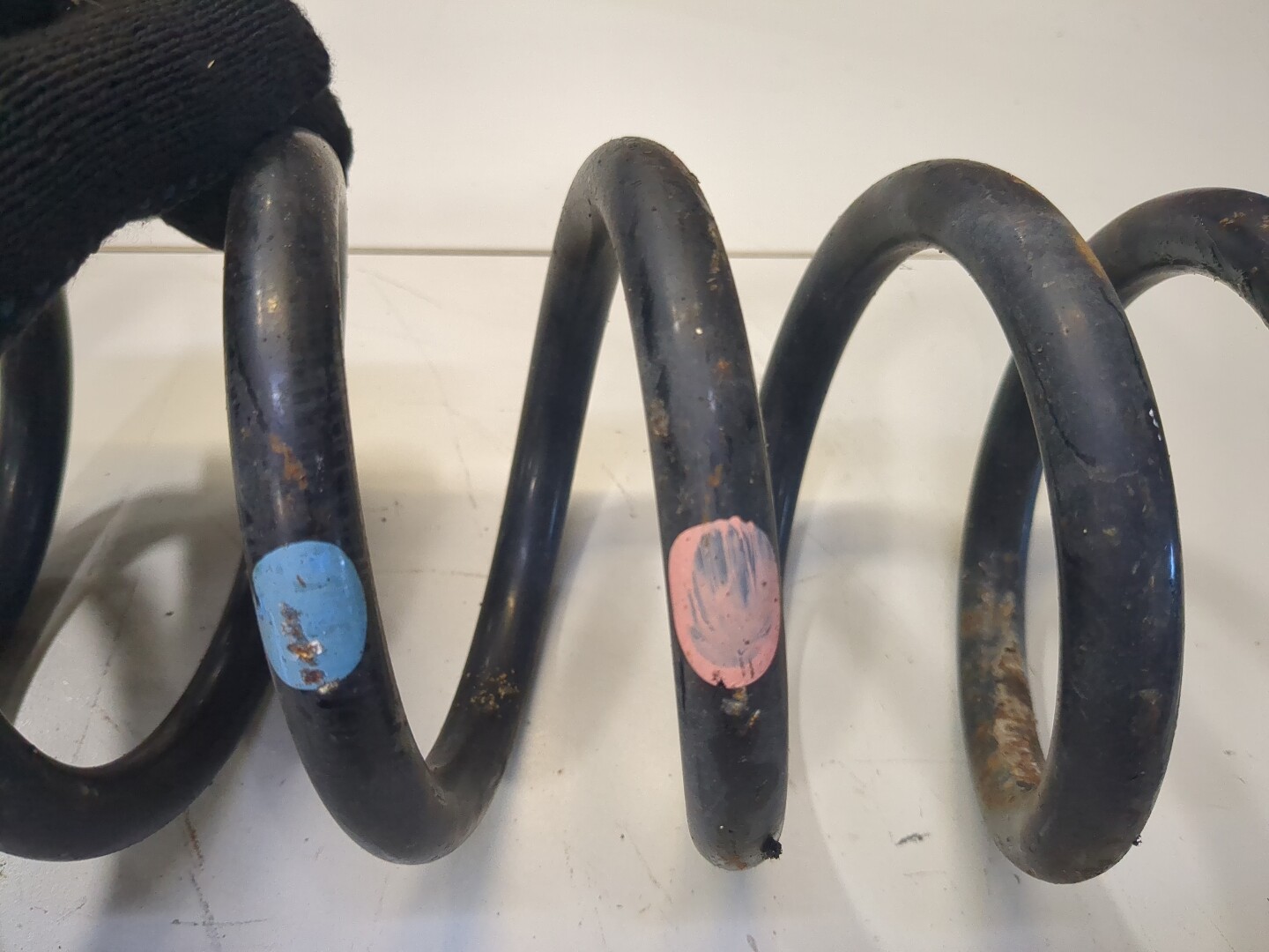 Пружина задняя