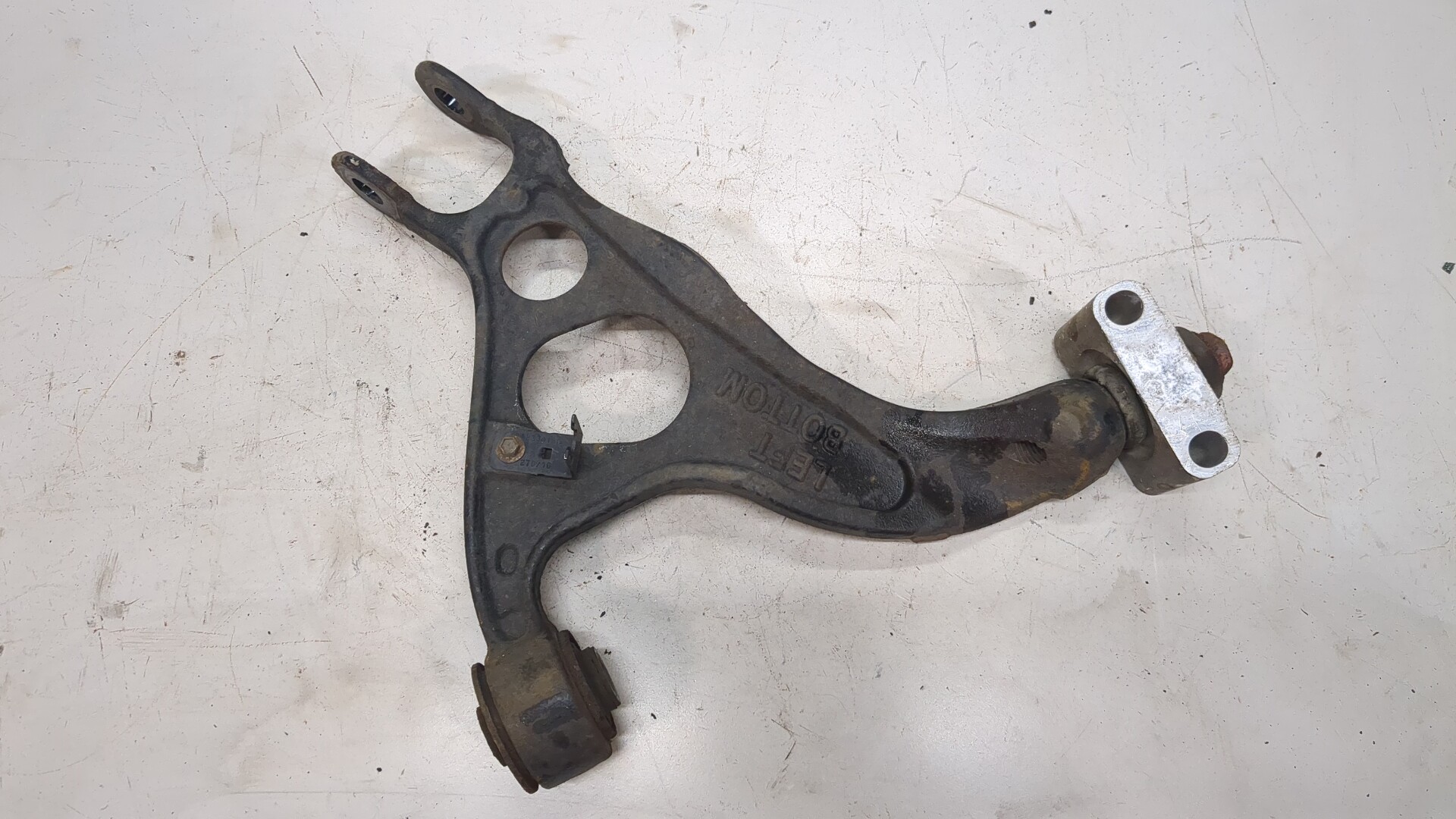 Рычаг задний левый