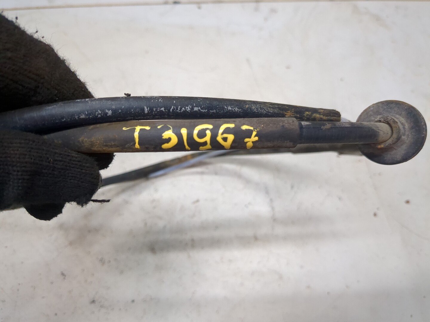 Трос стояночного тормоза