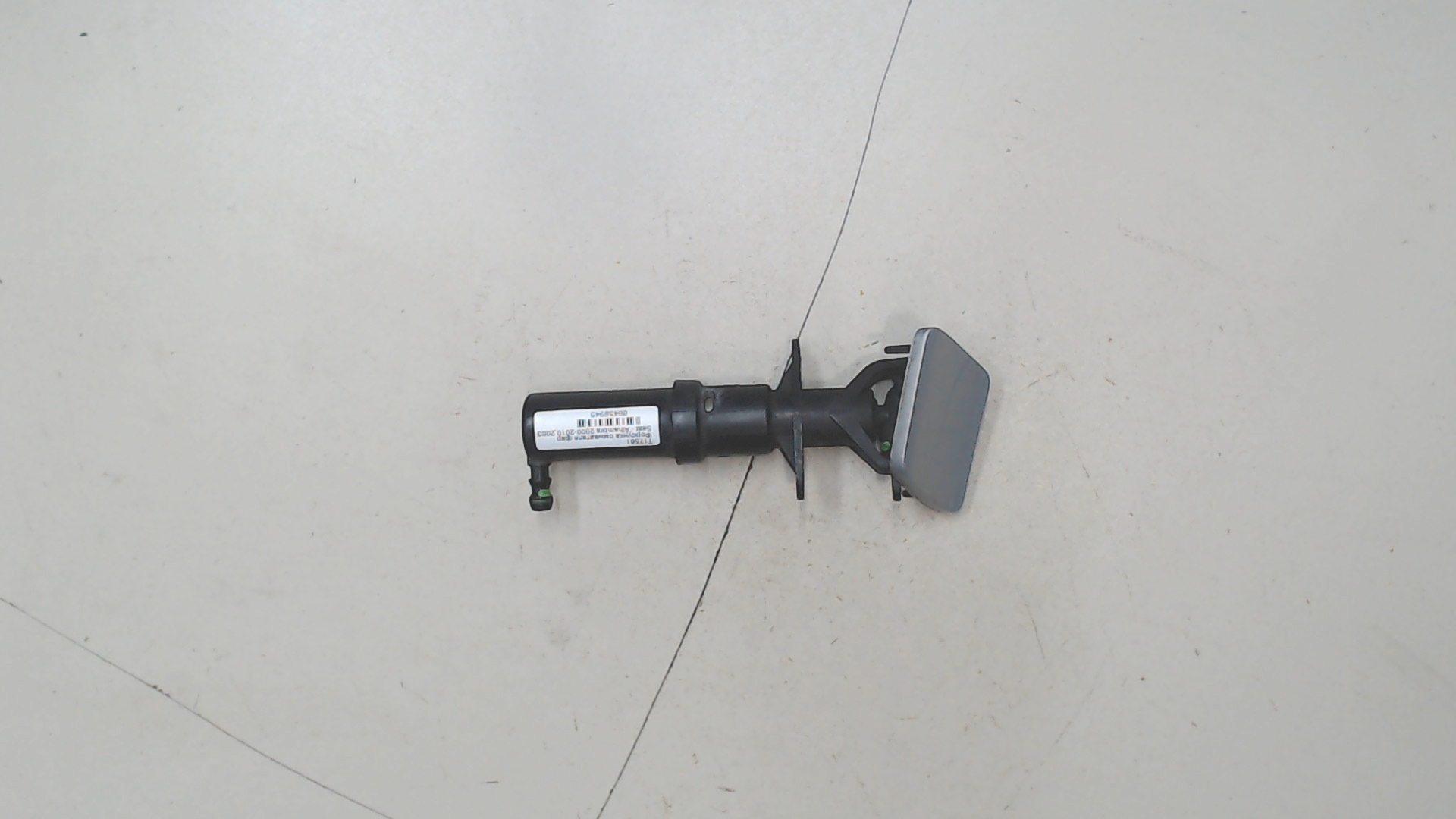 Форсунка омывателя фары