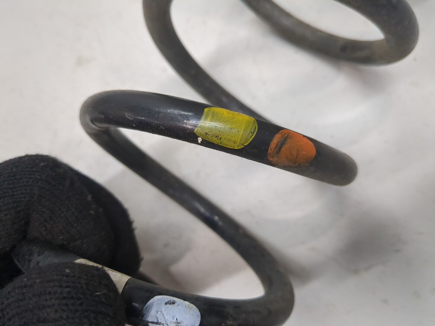 Пружина задняя