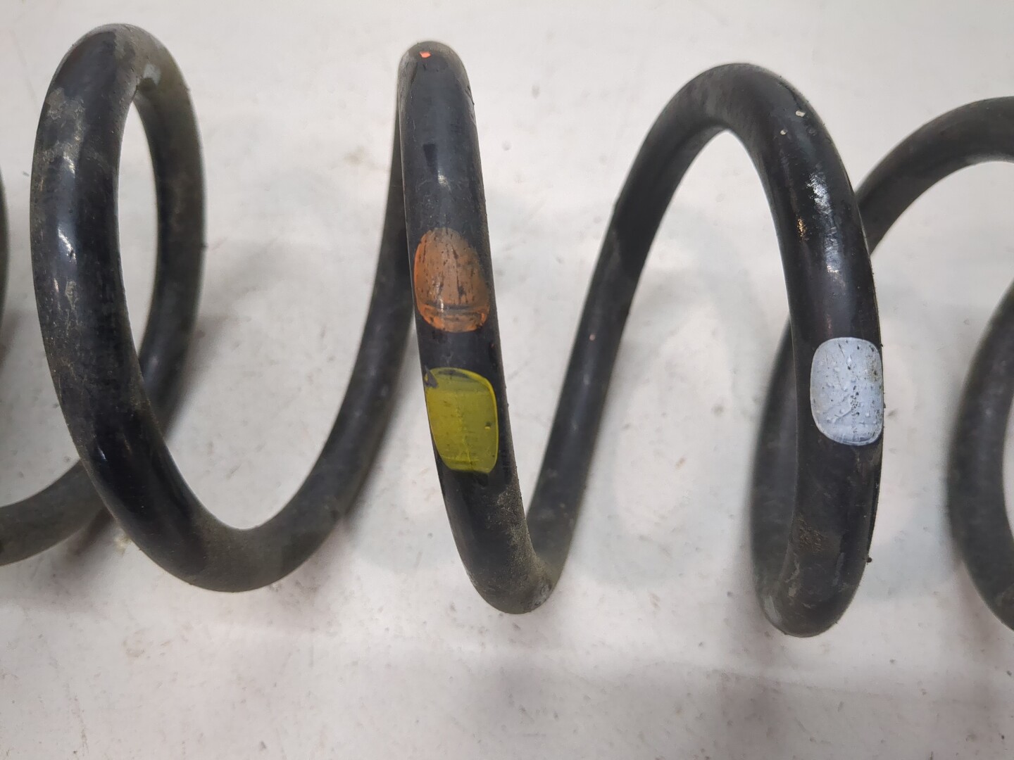 Пружина задняя