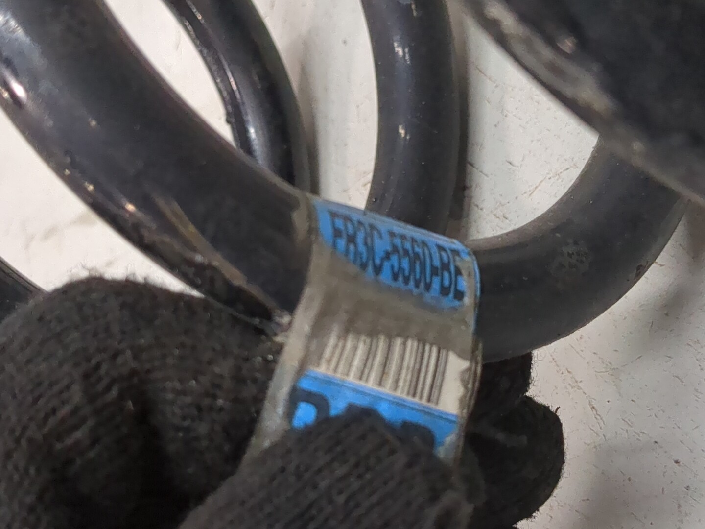 Пружина задняя