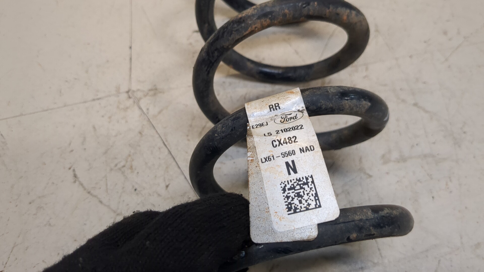 Пружина задняя