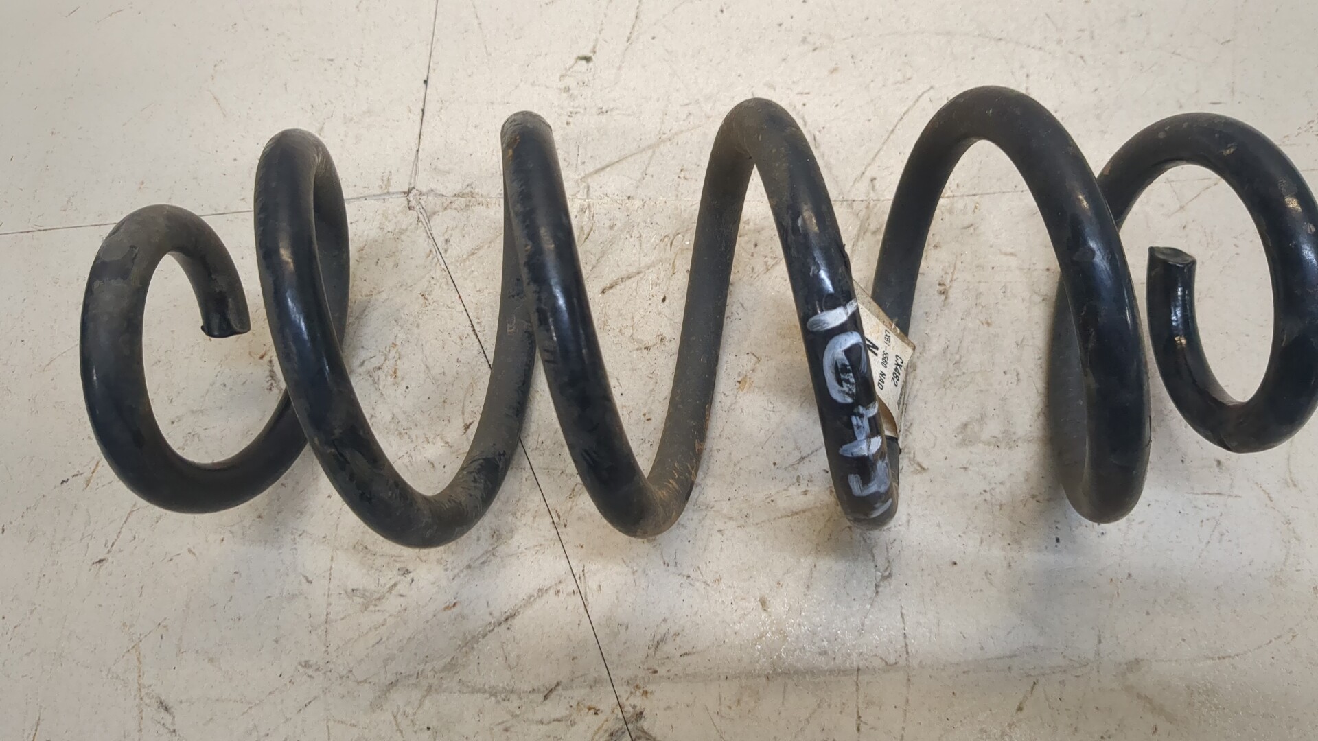 Пружина задняя