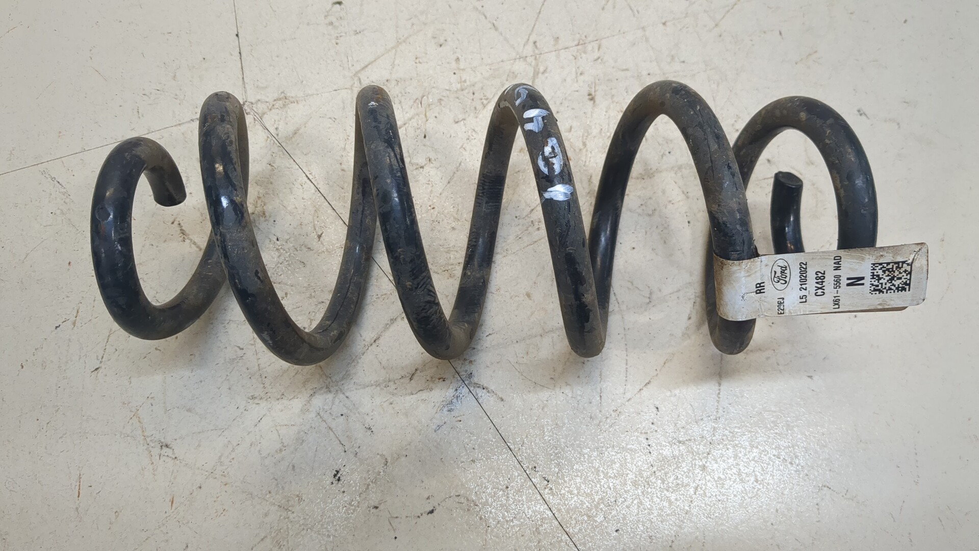 Пружина задняя