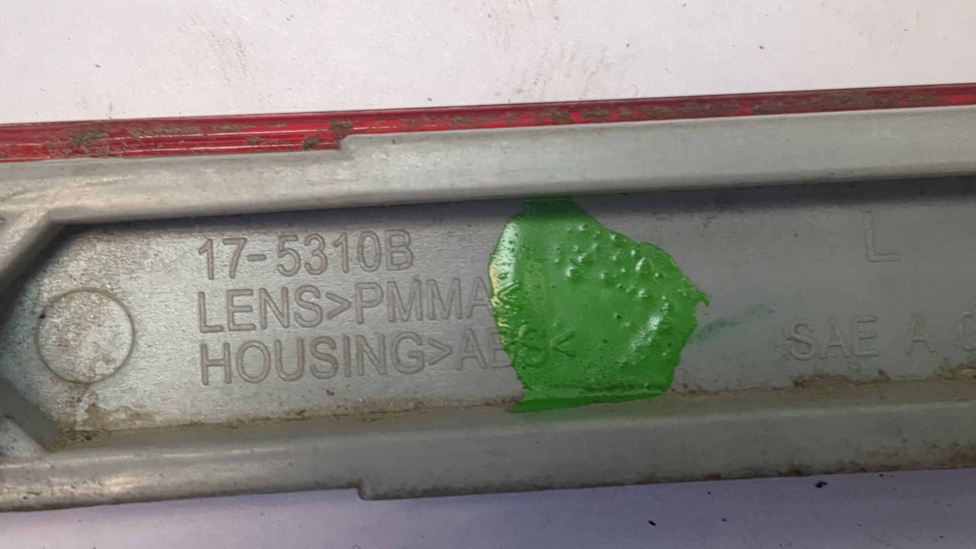 Отражатель в бампер задний левый