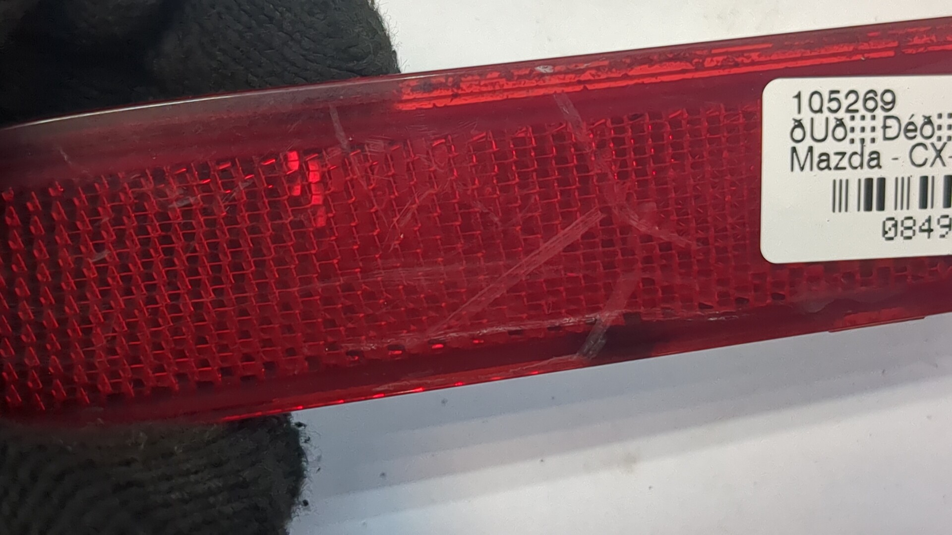 Отражатель в бампер задний левый