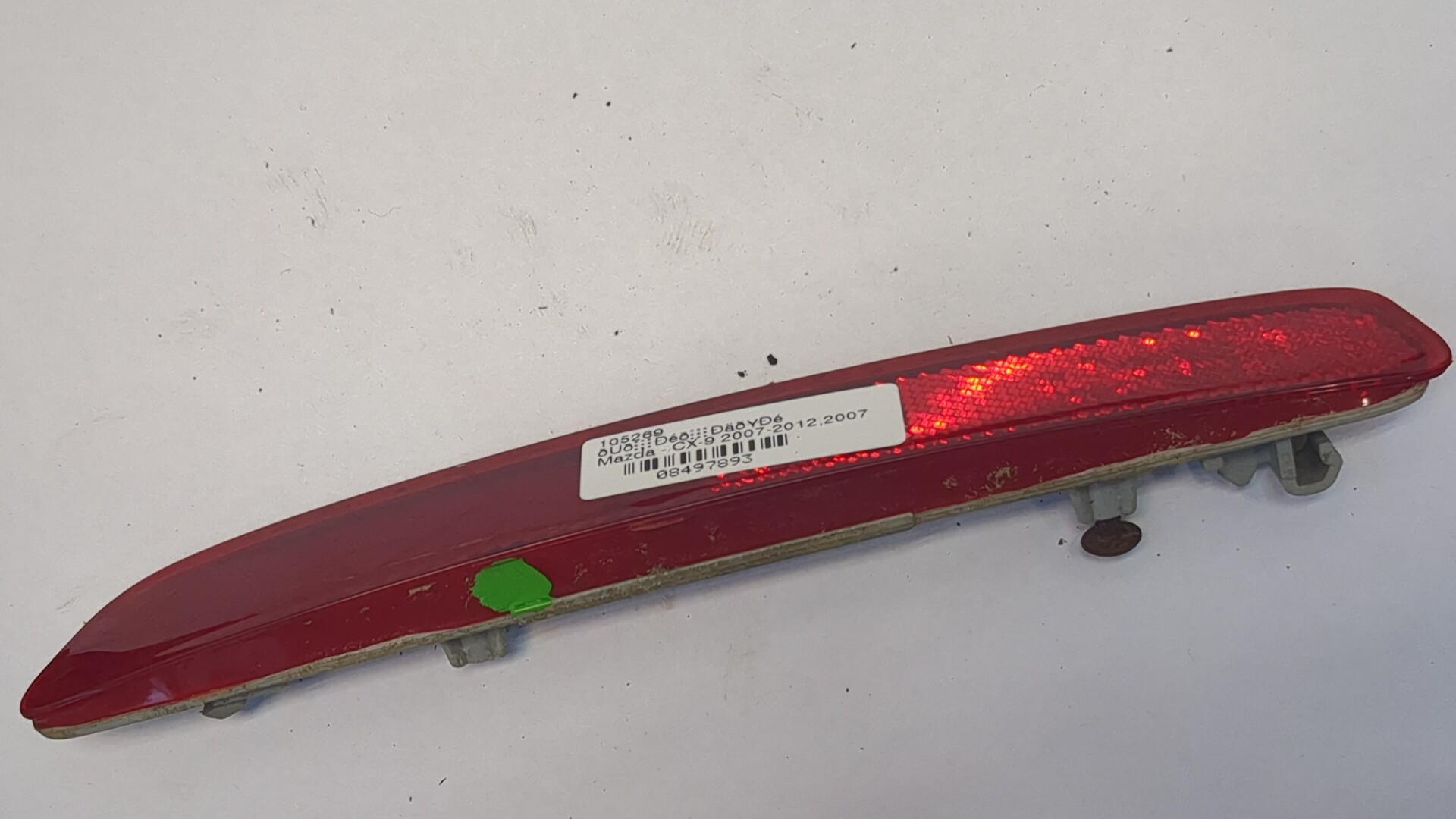 Отражатель в бампер задний левый