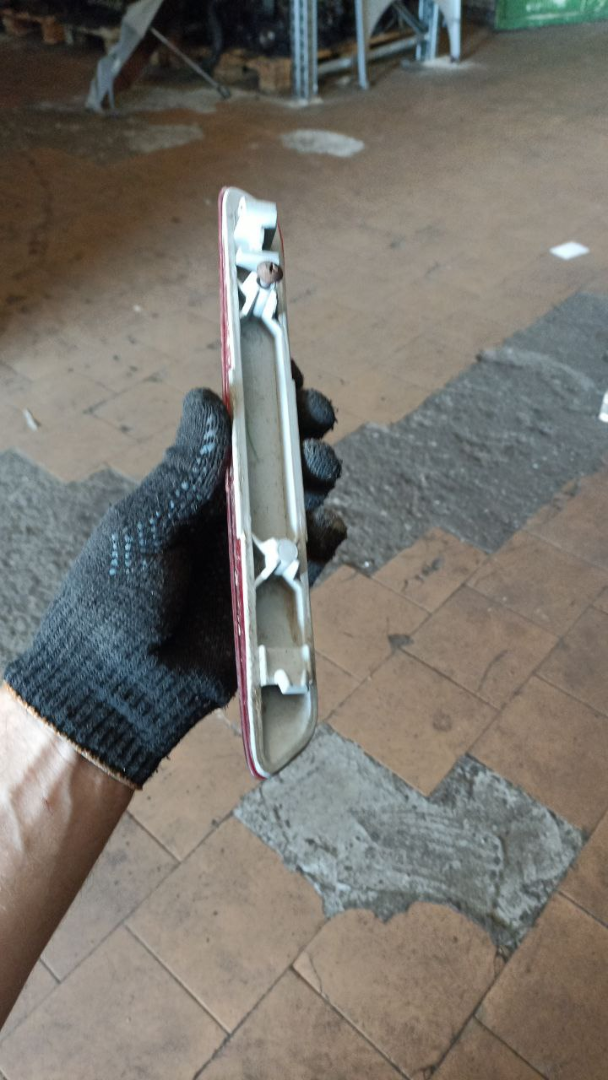 Отражатель в бампер задний левый