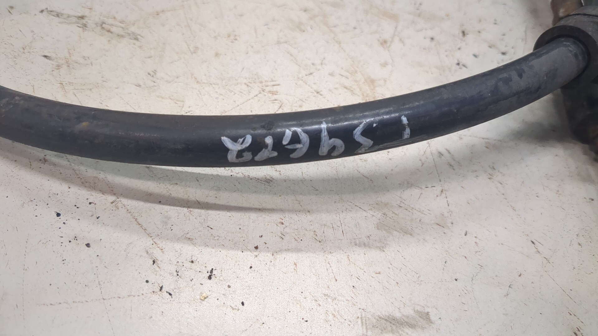 Трос стояночного тормоза