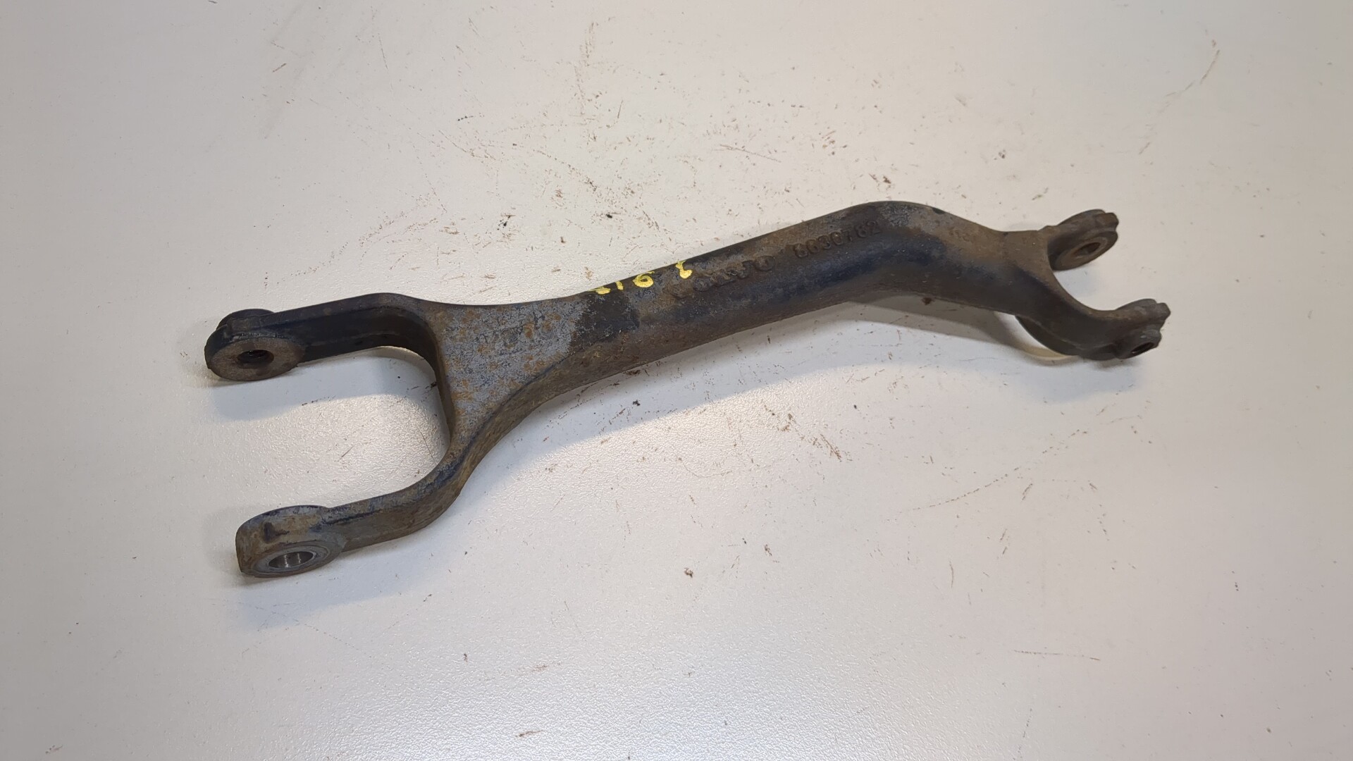 Рычаг задний левый