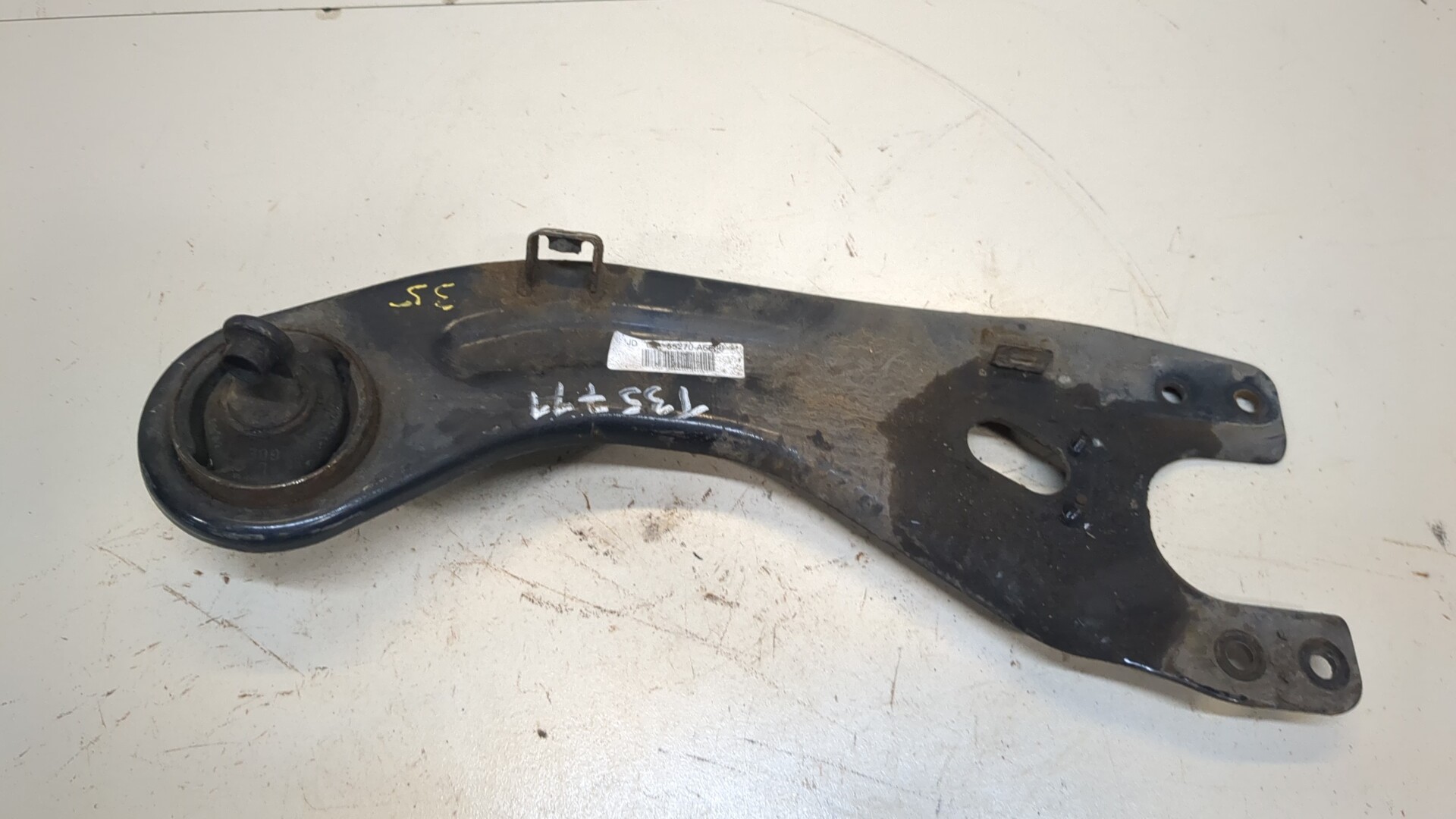 Рычаг задний левый