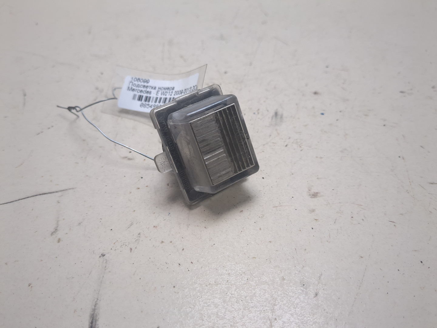 Фонарь подсветки номера