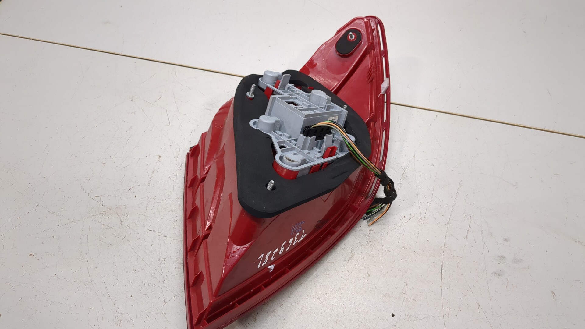 Фонарь задний левый