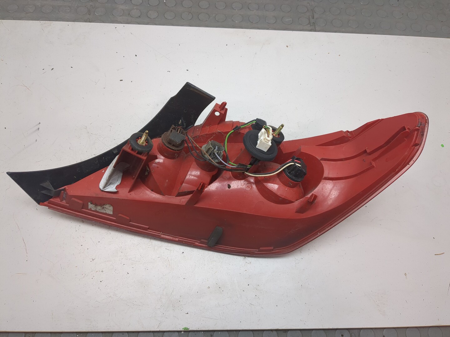 Фонарь задний левый