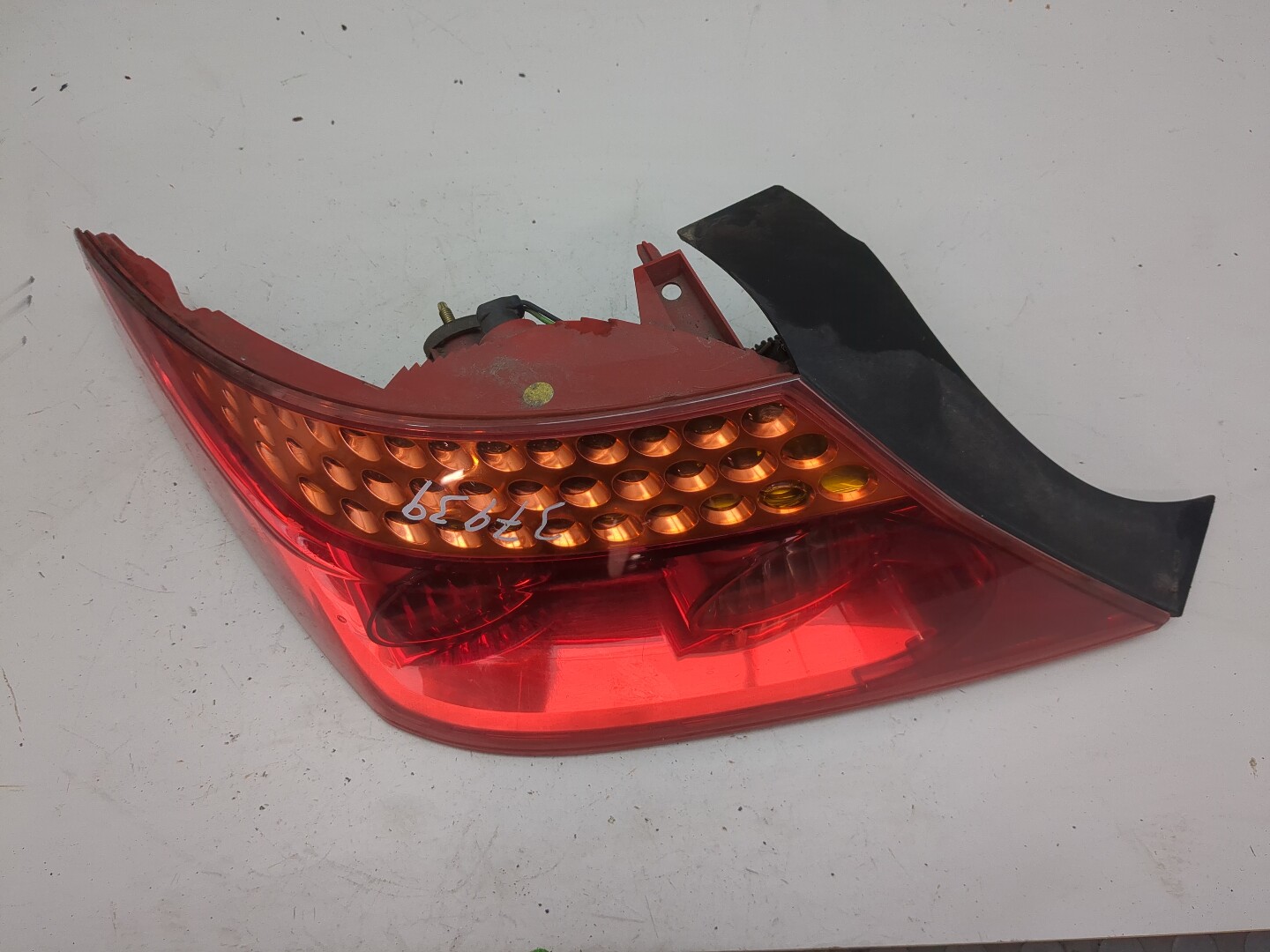 Фонарь задний левый