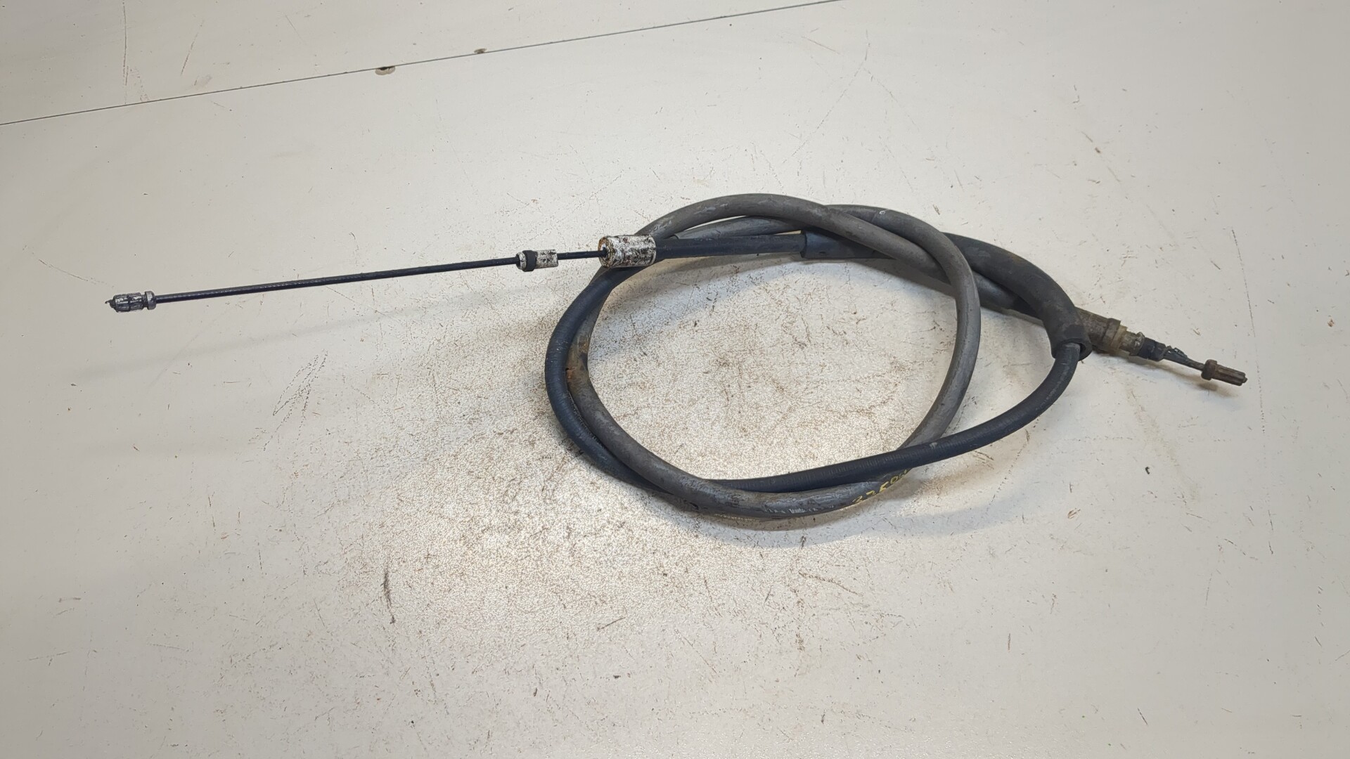 Трос стояночного тормоза