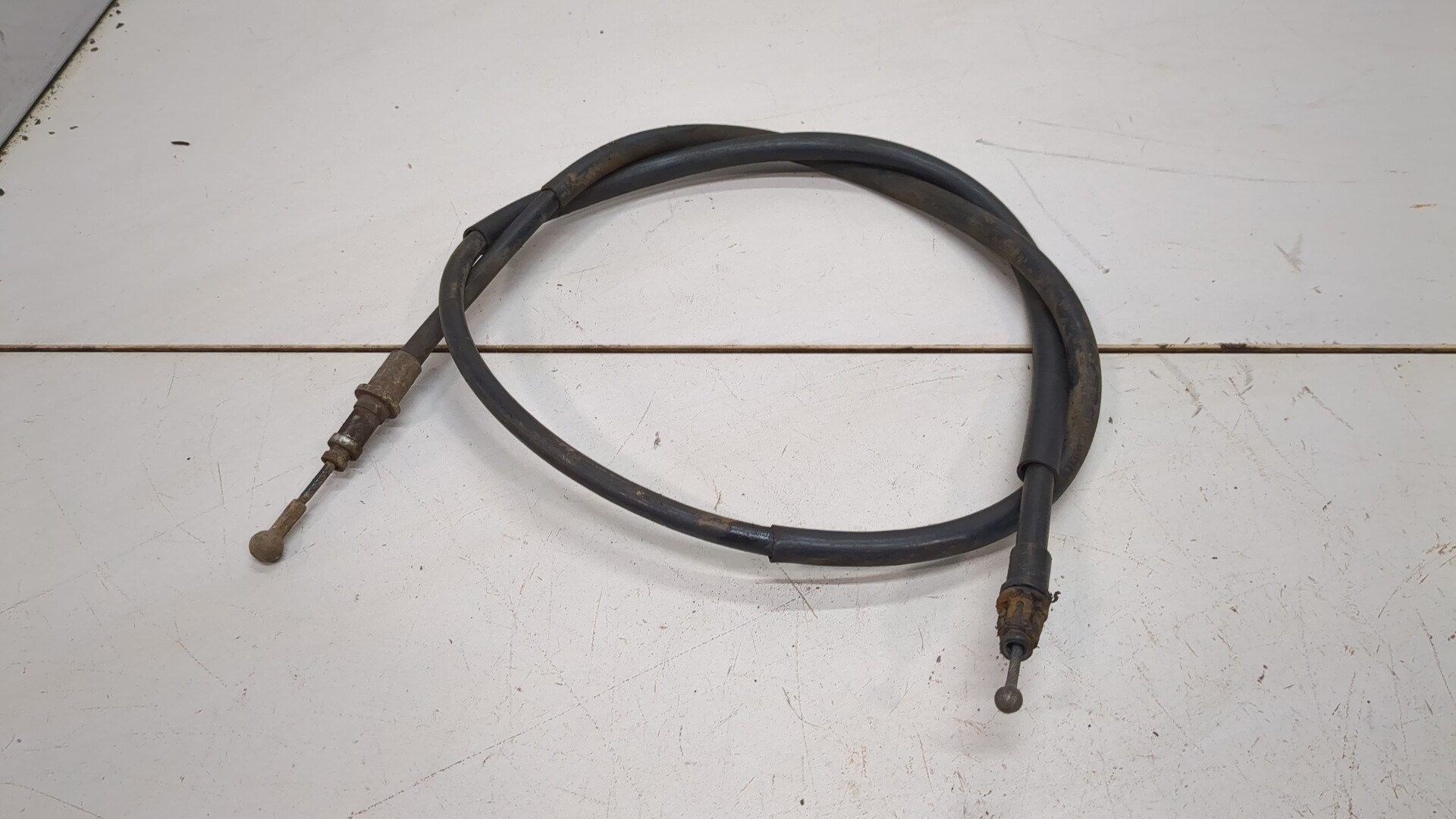 Трос стояночного тормоза