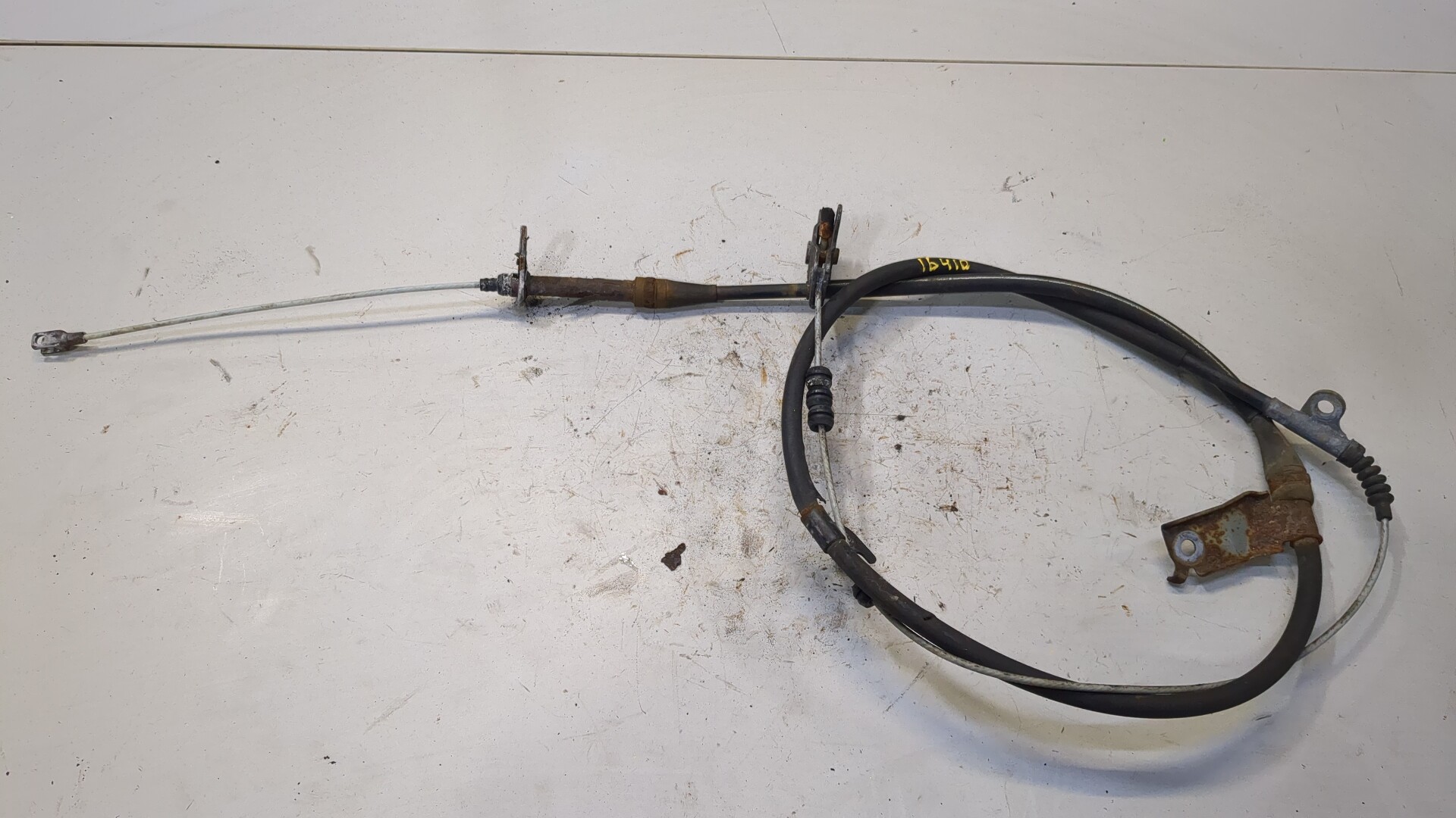 Трос стояночного тормоза