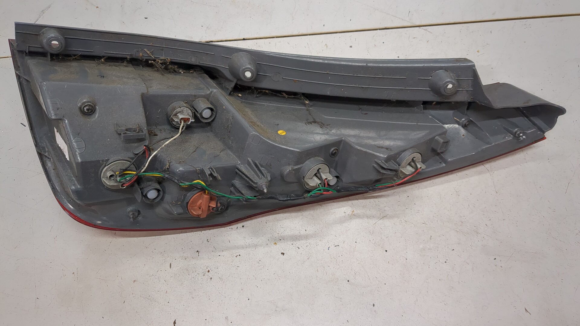 Фонарь задний левый