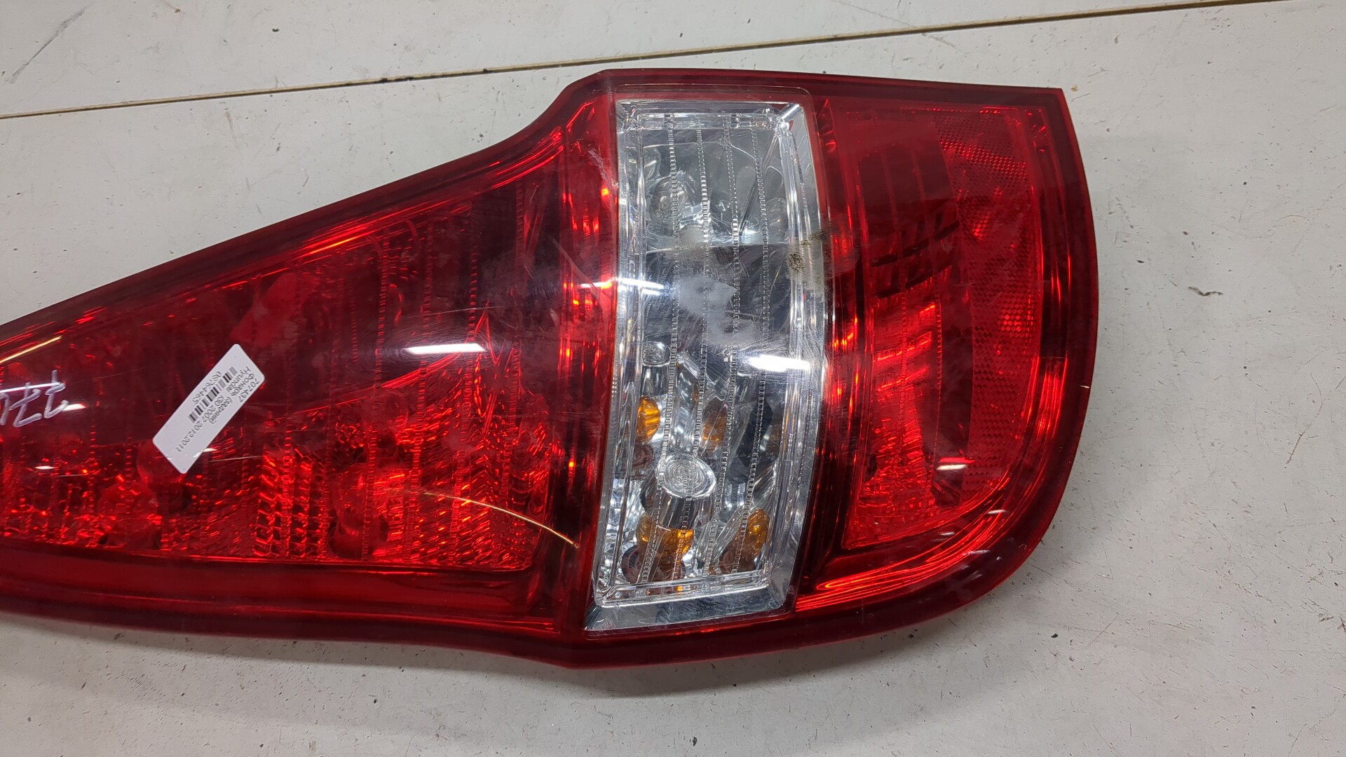 Фонарь задний левый